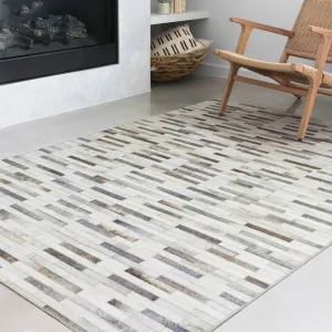 Alexander Home Davide Printed Faux Cowhide Area Rug