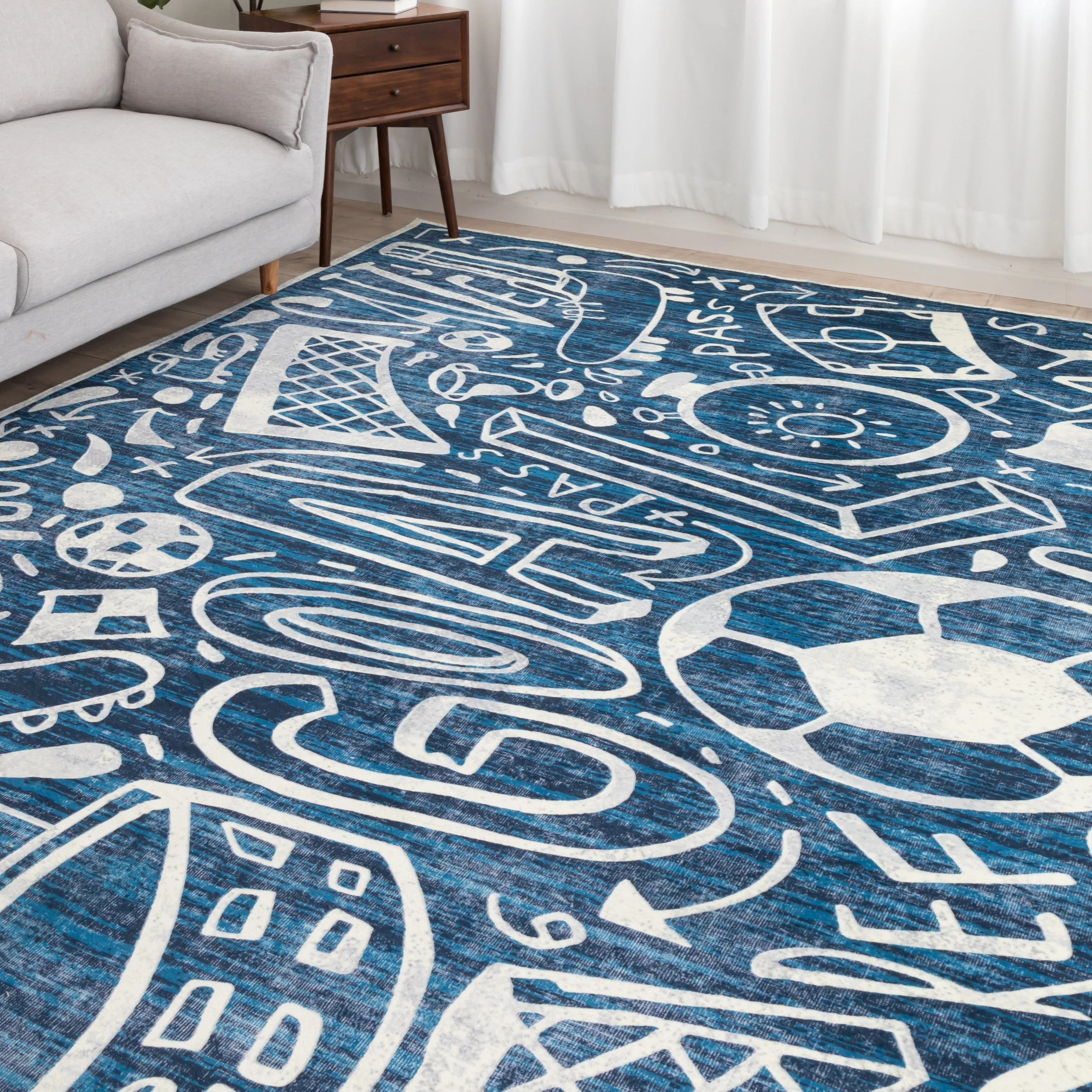 Katie Merz SPORTSGLYPHS Soccer Area Rug