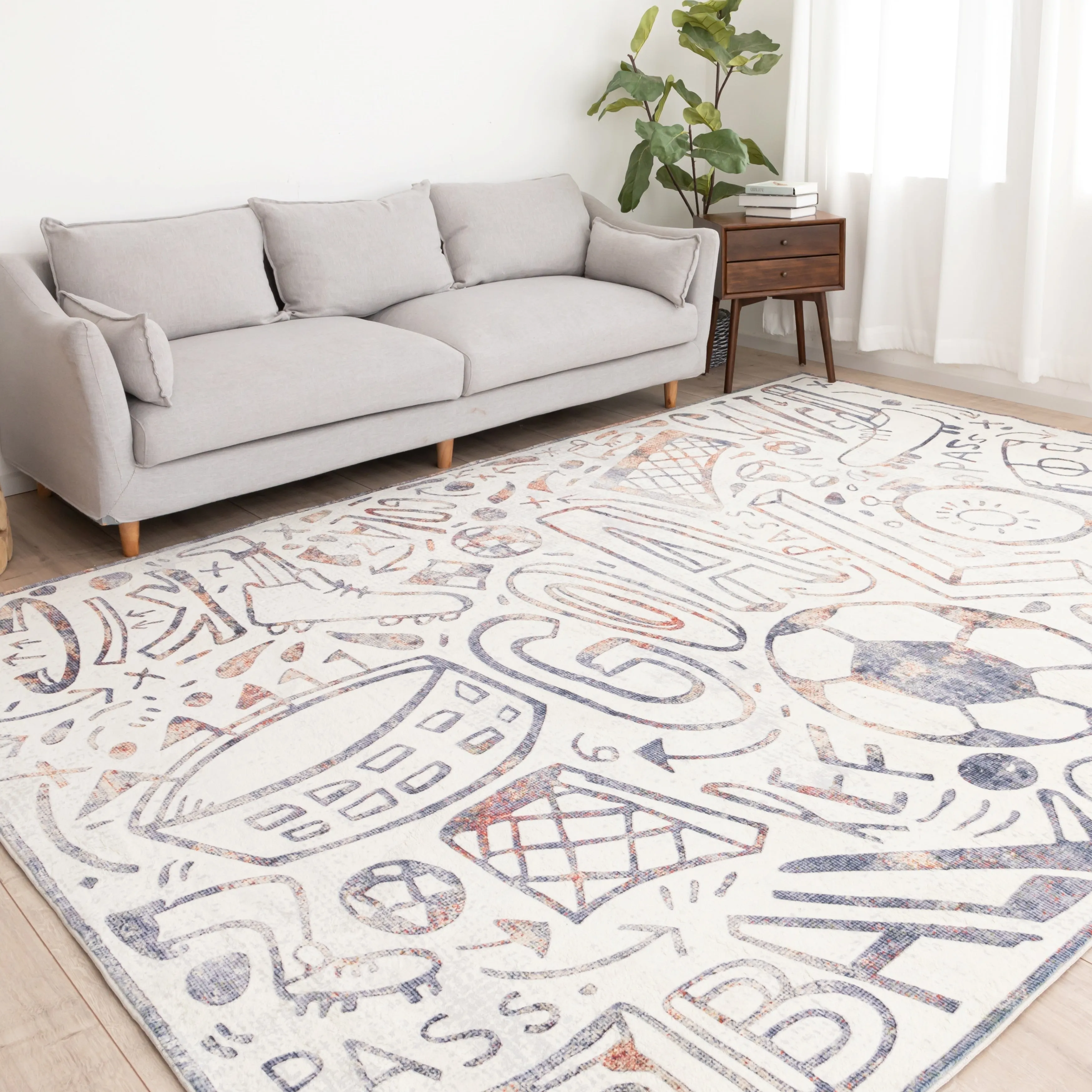 Katie Merz SPORTSGLYPHS Soccer Area Rug