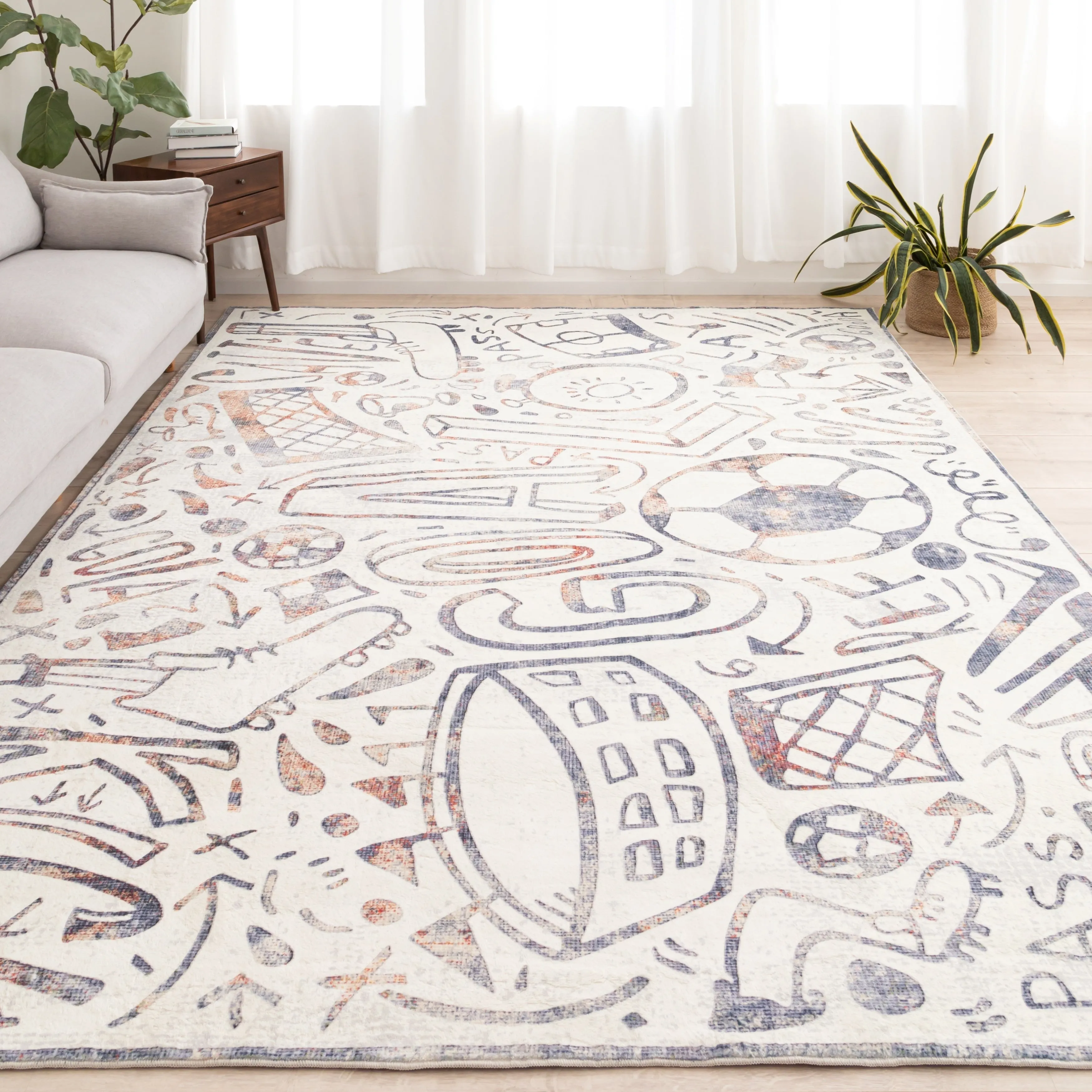 Katie Merz SPORTSGLYPHS Soccer Area Rug
