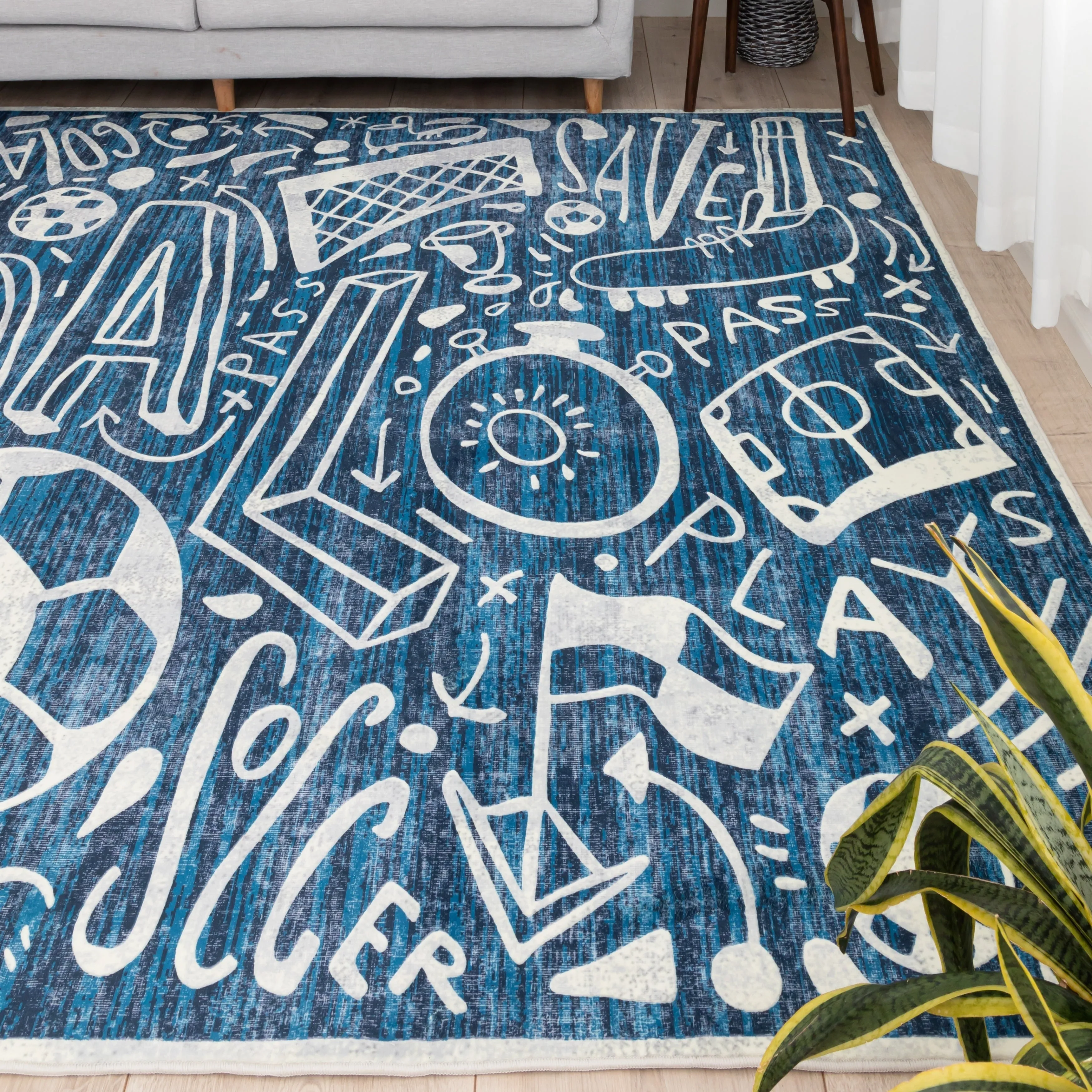 Katie Merz SPORTSGLYPHS Soccer Area Rug