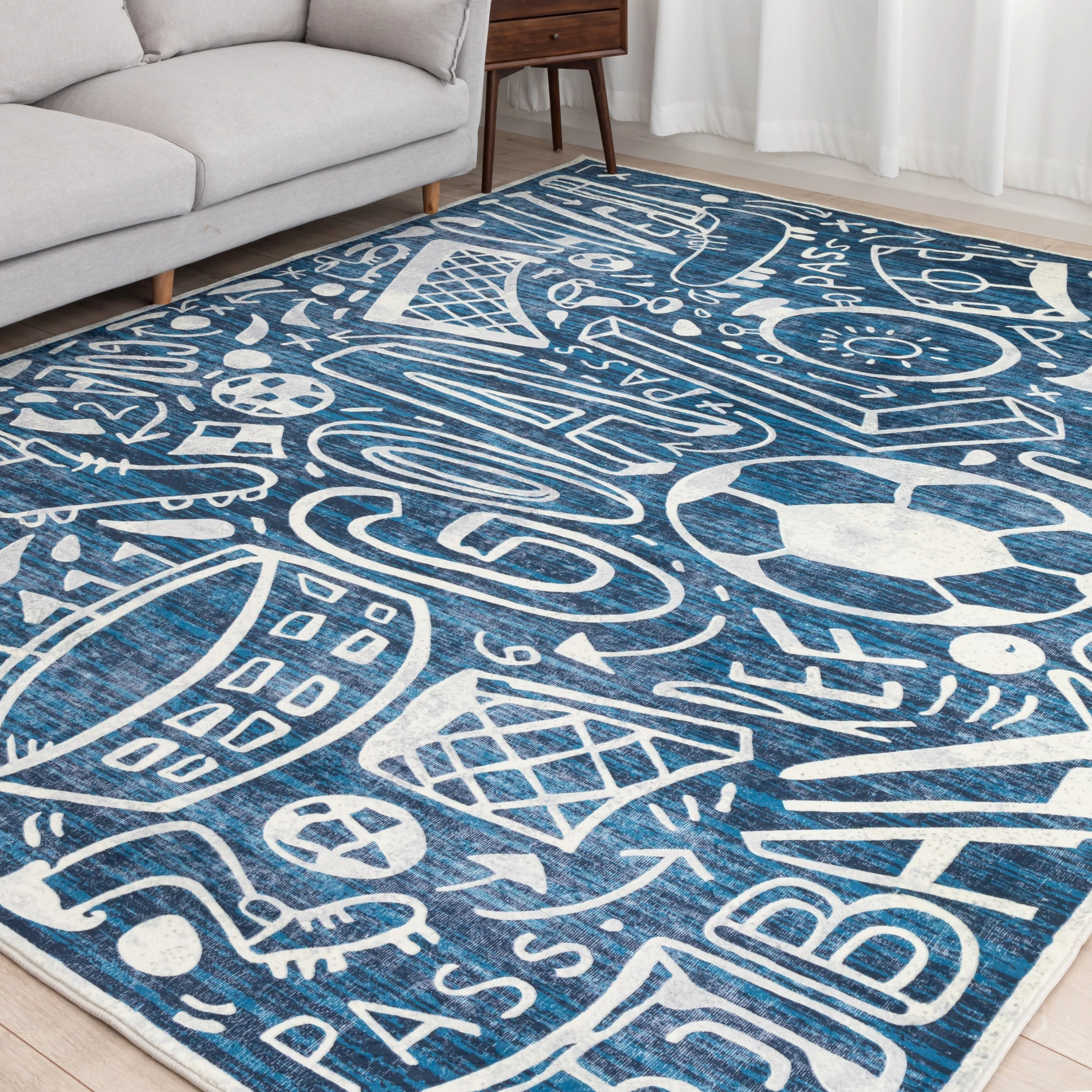 Katie Merz SPORTSGLYPHS Soccer Area Rug