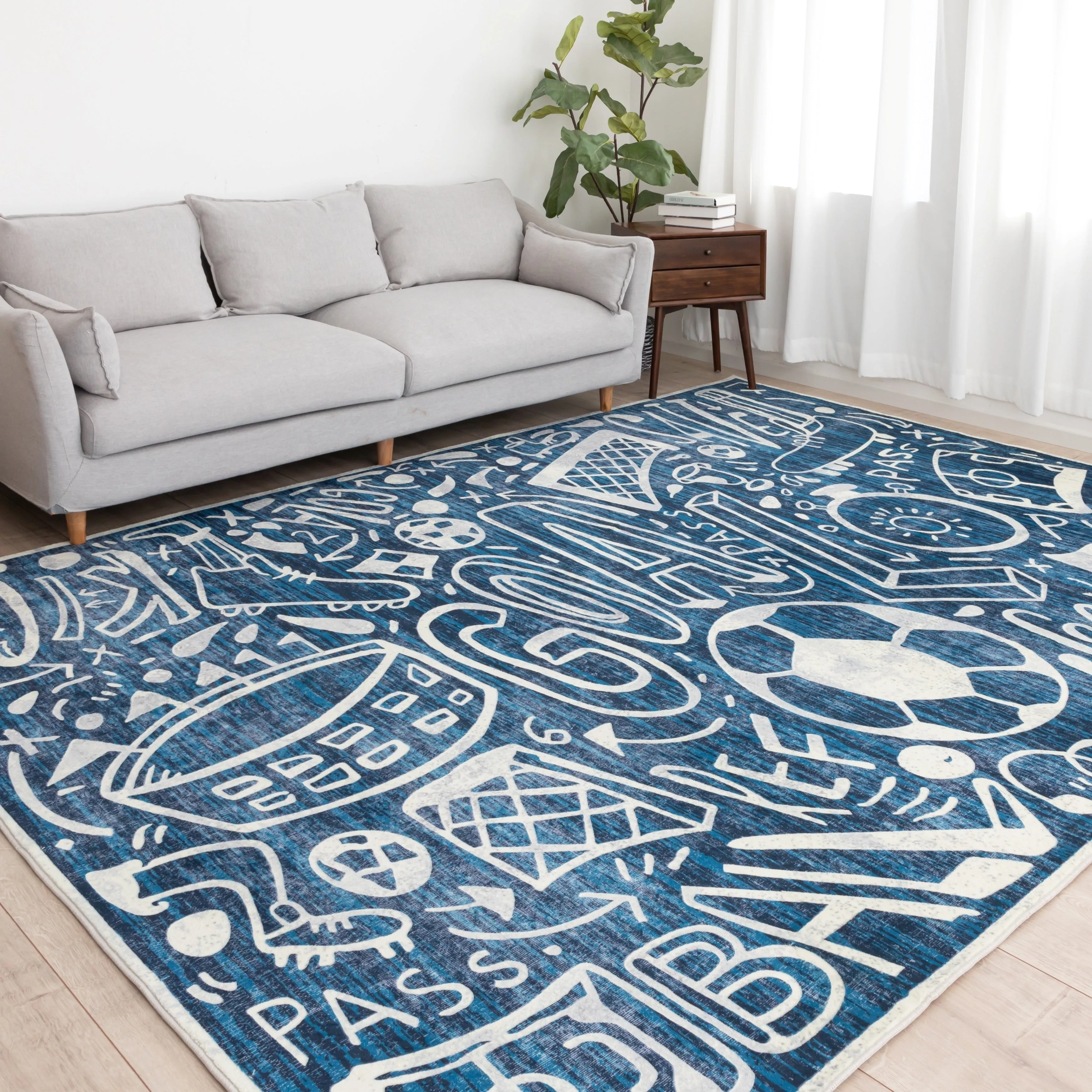 Katie Merz SPORTSGLYPHS Soccer Area Rug