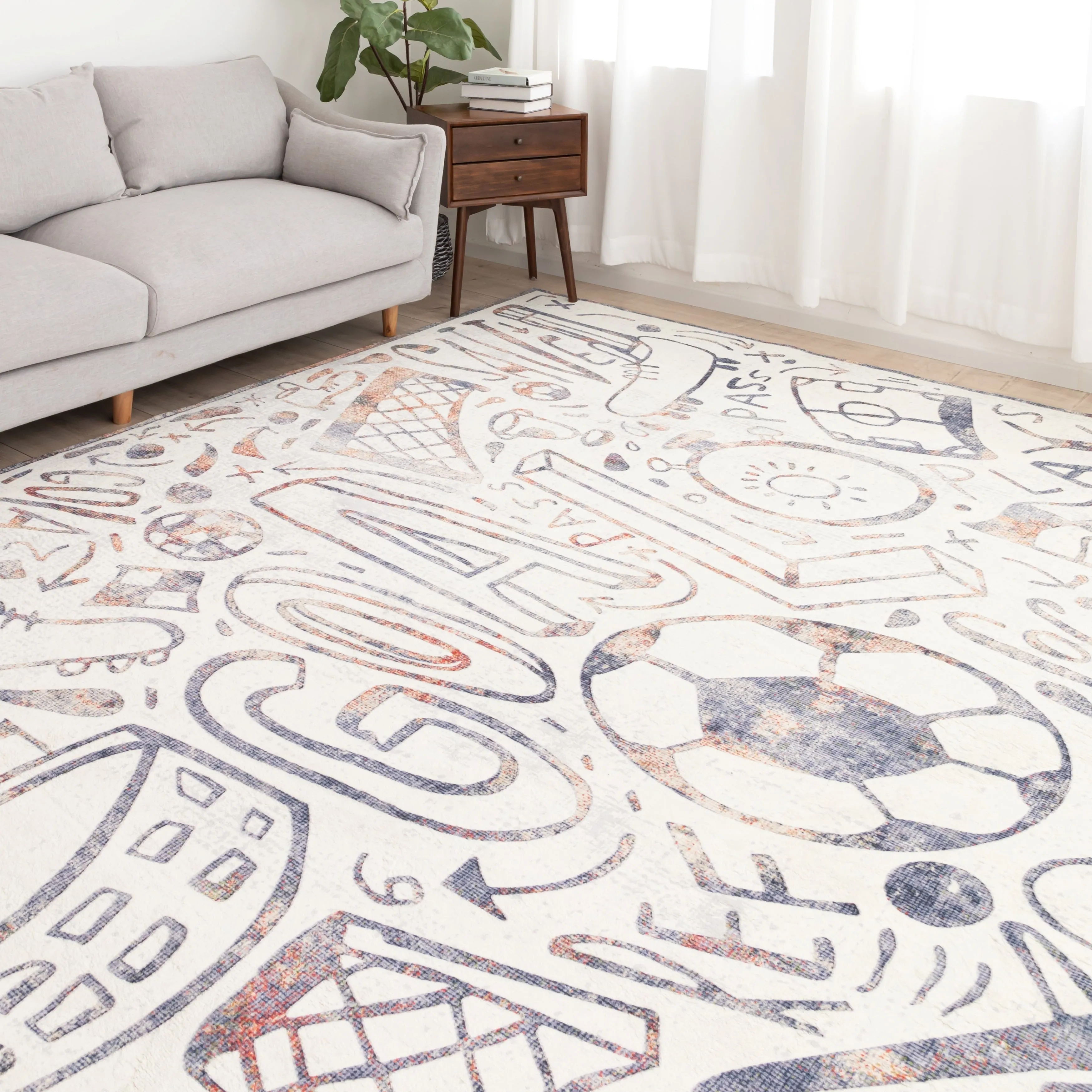 Katie Merz SPORTSGLYPHS Soccer Area Rug