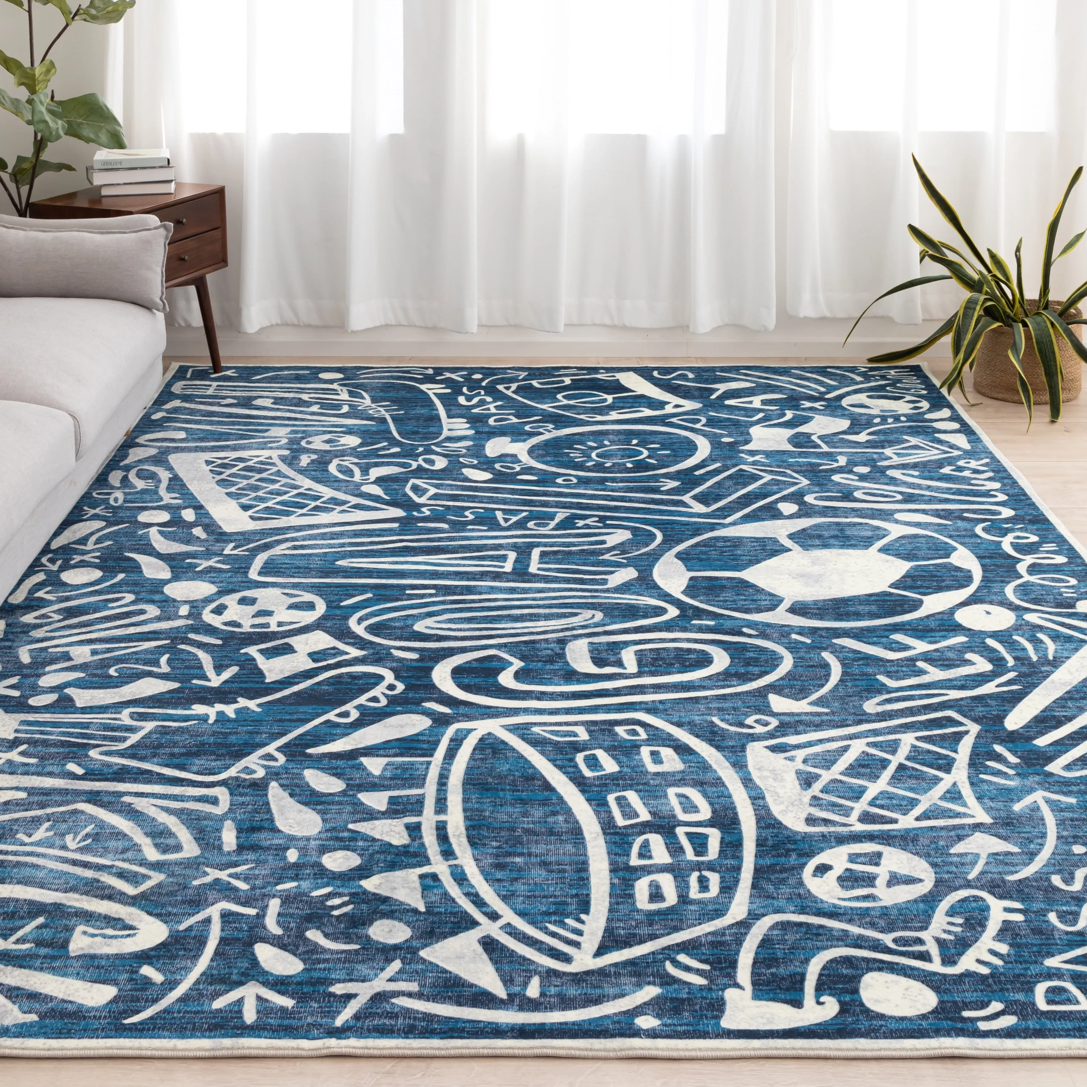 Katie Merz SPORTSGLYPHS Soccer Area Rug