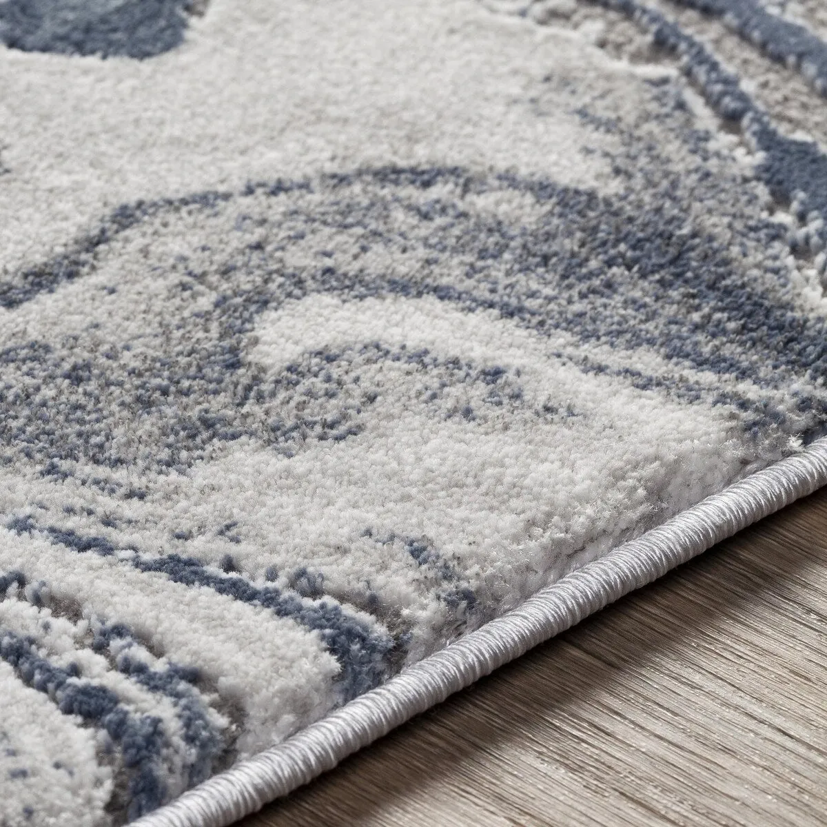 Livabliss Tibetan Modern Swirl Area Rug