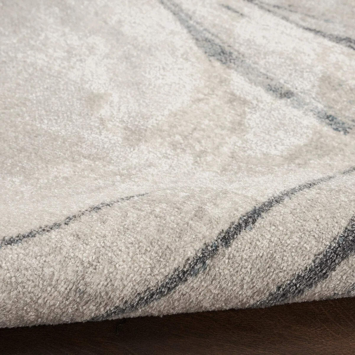 Nourison Astra Machine Washable Indoor only Abstract Area Rug