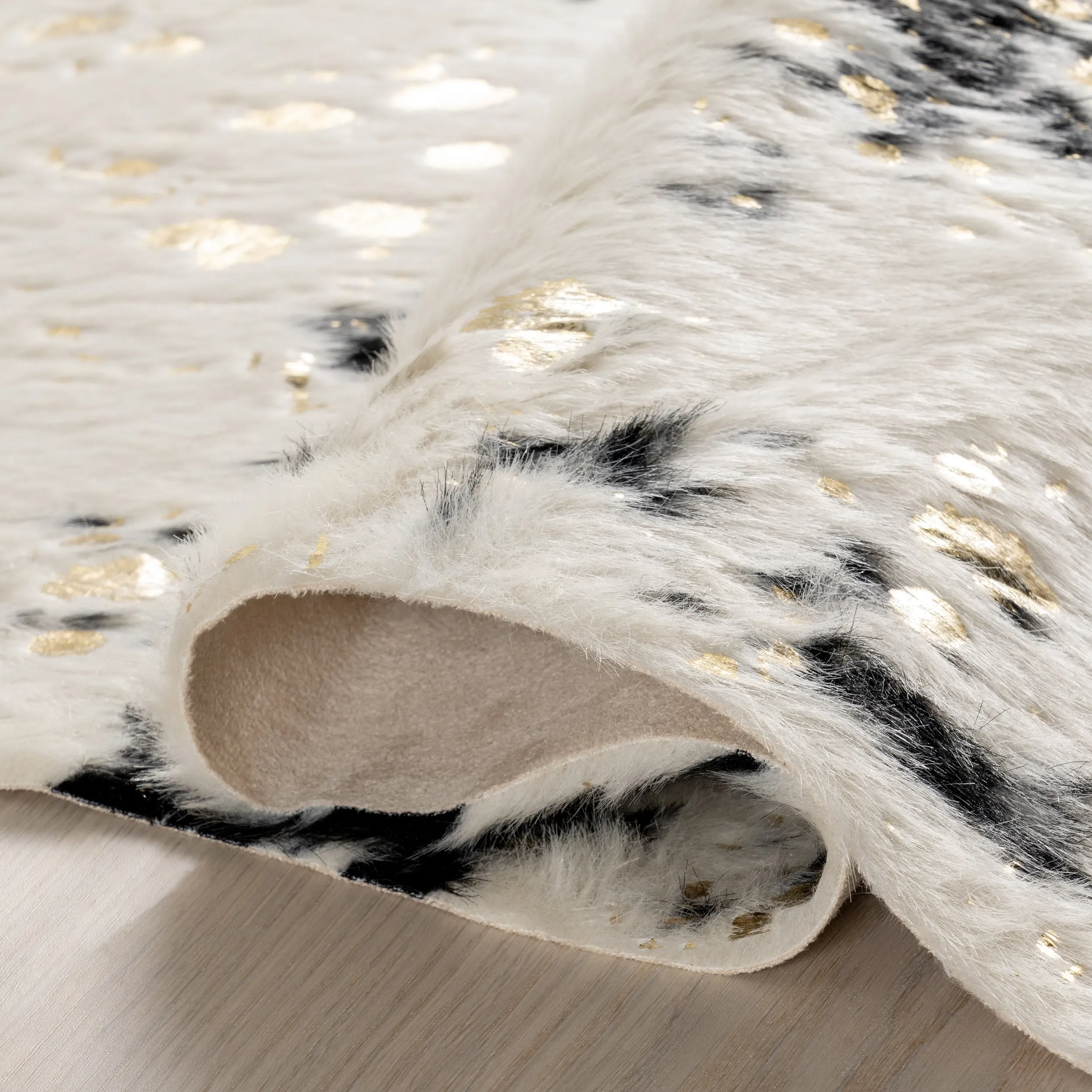 Nuloom Contemporary Faux Animal Prints Cowhide Area Rug