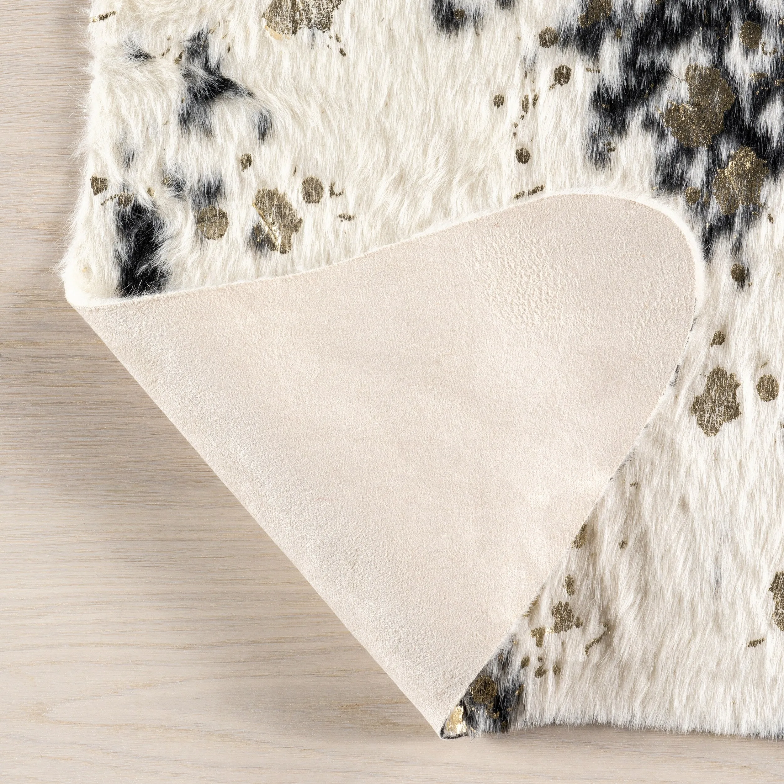Nuloom Contemporary Faux Animal Prints Cowhide Area Rug