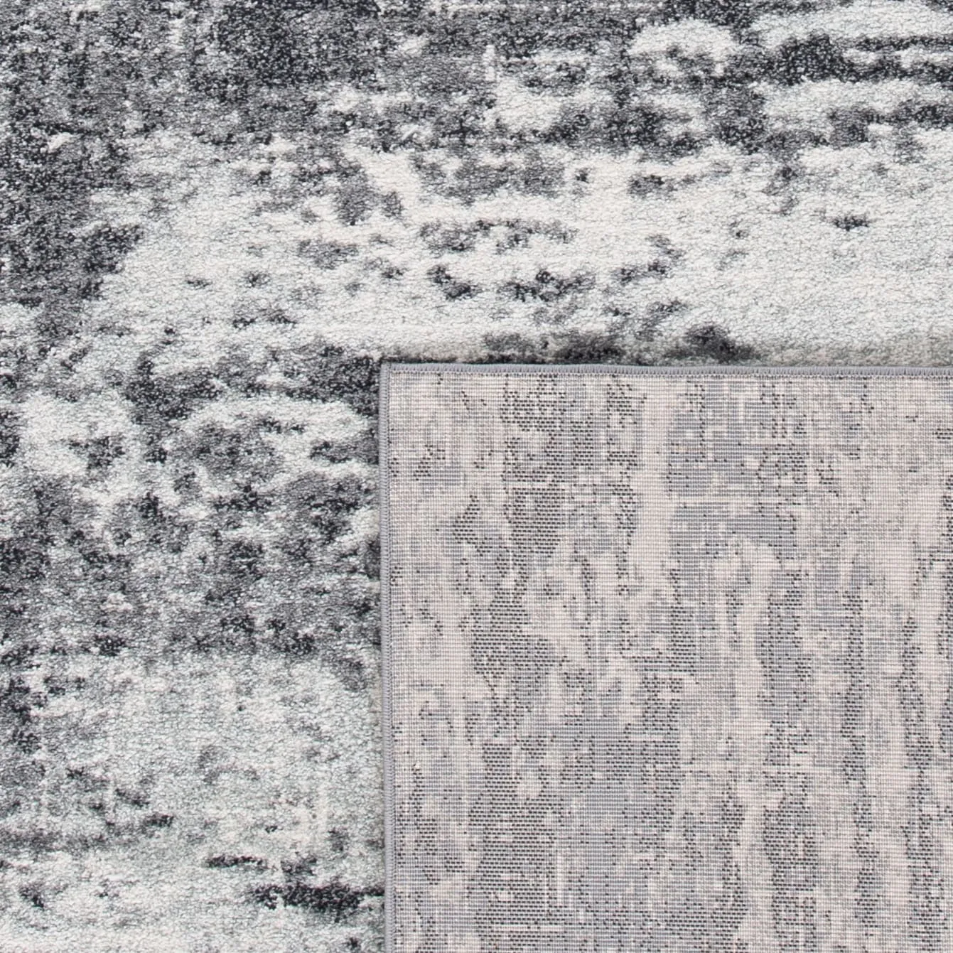 SAFAVIEH. Evoke Yukako Modern Abstract Distressed Rug