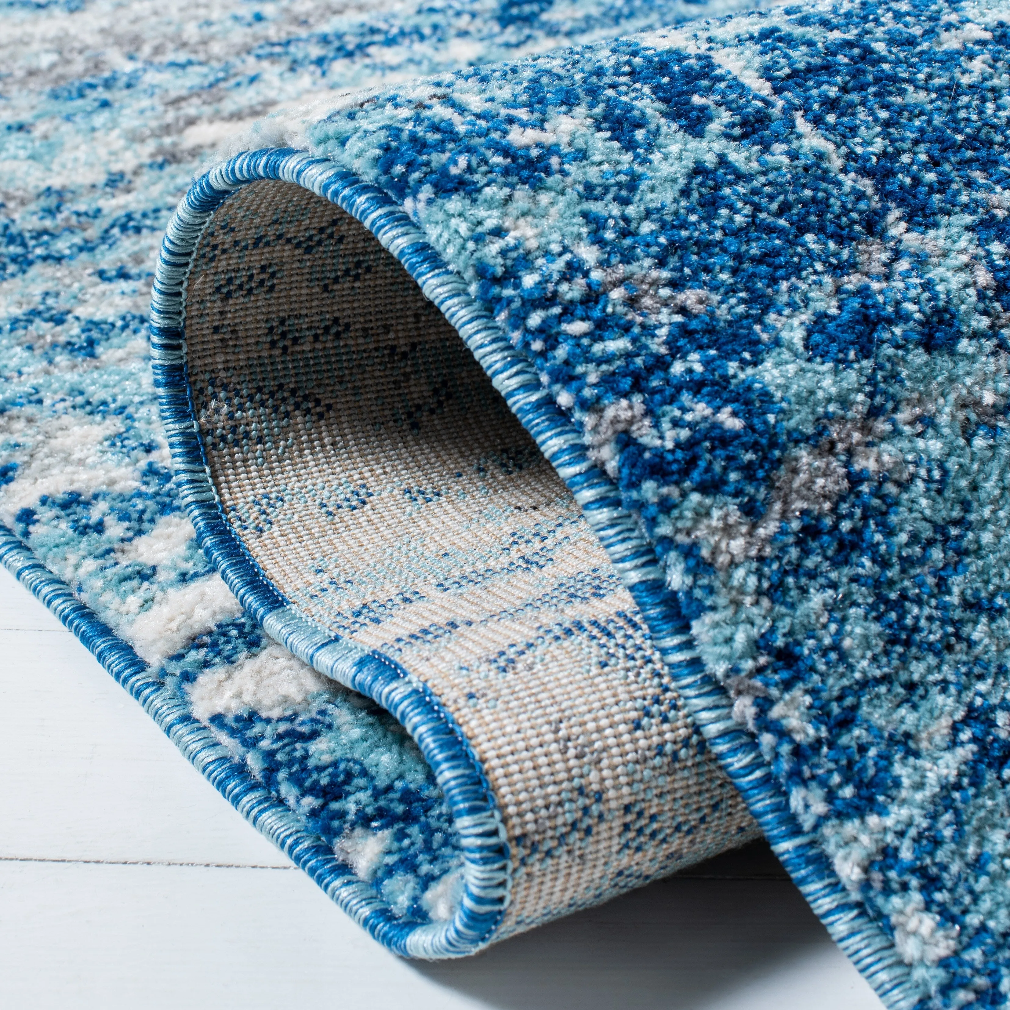 SAFAVIEH. Evoke Yukako Modern Abstract Distressed Rug