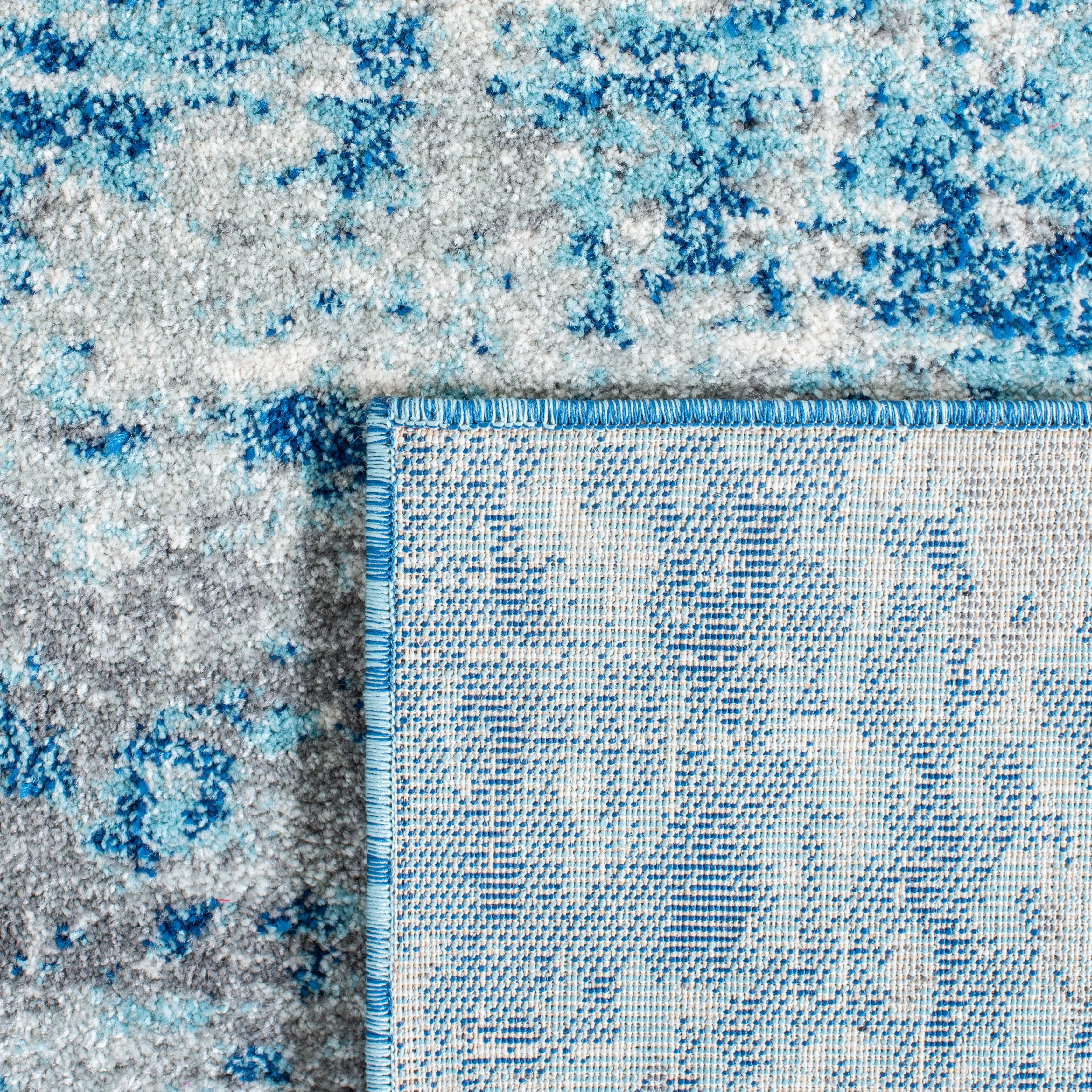 SAFAVIEH. Evoke Yukako Modern Abstract Distressed Rug