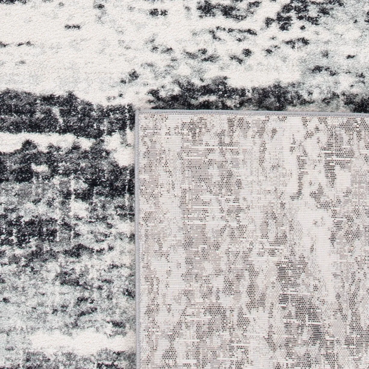 SAFAVIEH. Evoke Yukako Modern Abstract Distressed Rug