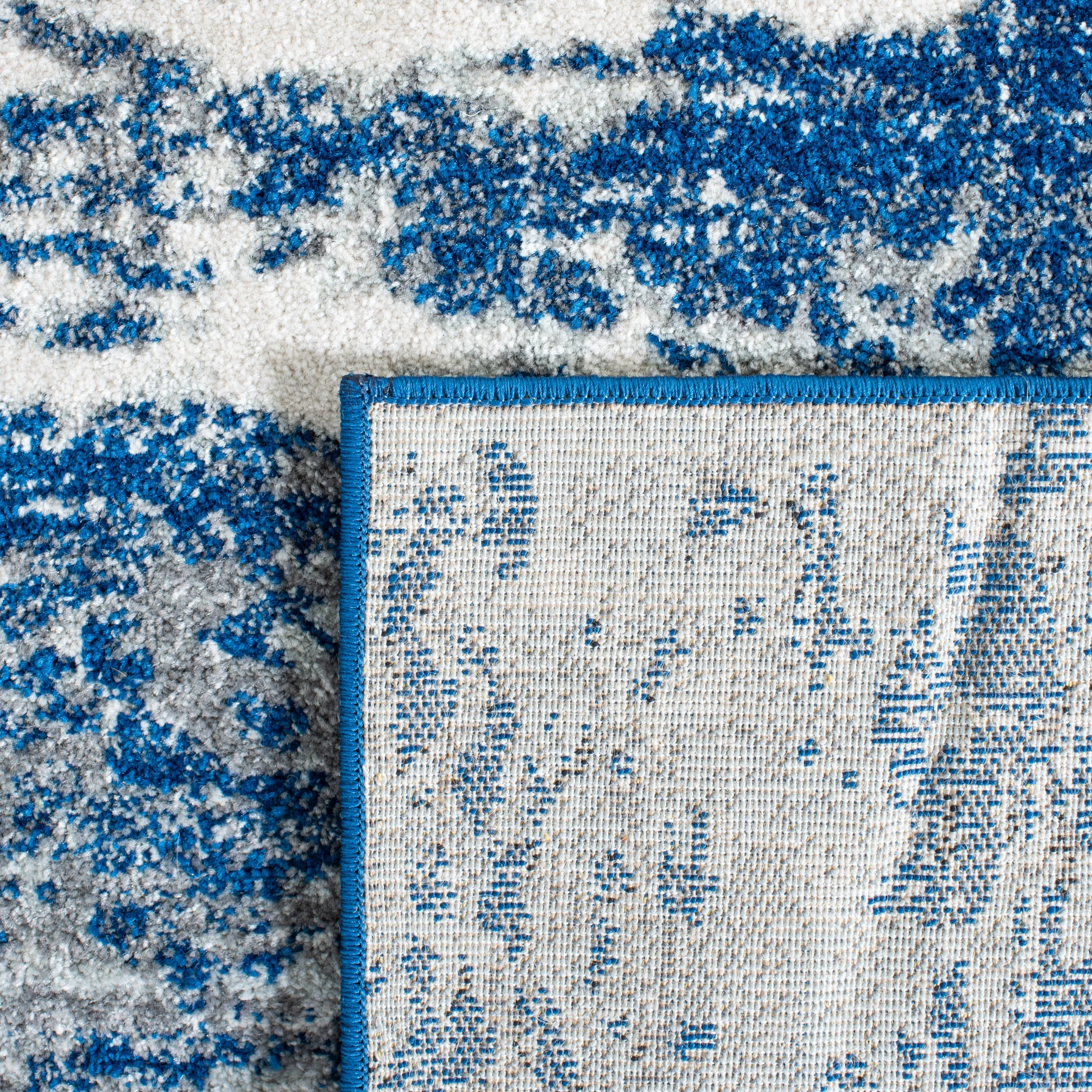 SAFAVIEH. Evoke Yukako Modern Abstract Distressed Rug