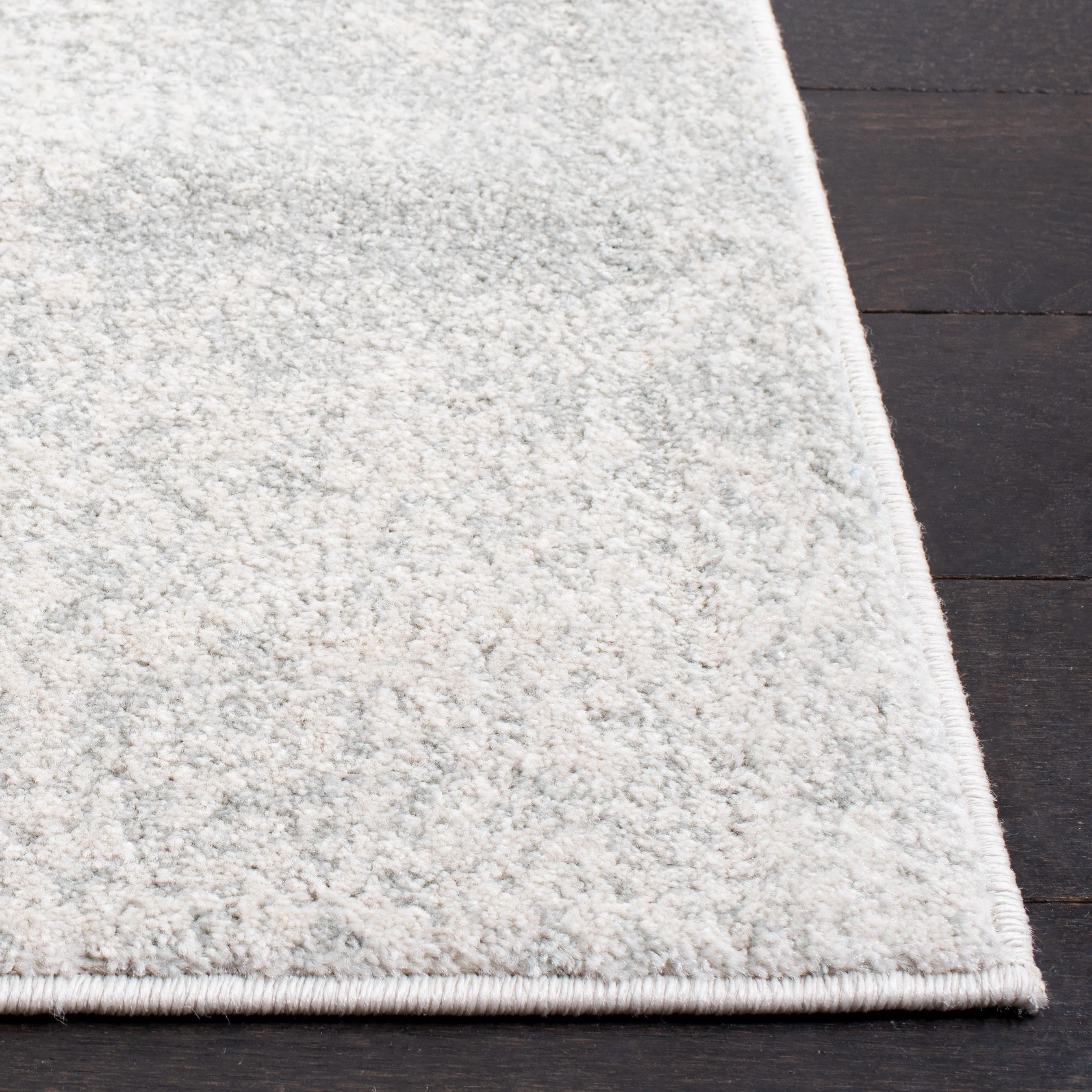 SAFAVIEH. Evoke Yukako Modern Abstract Distressed Rug