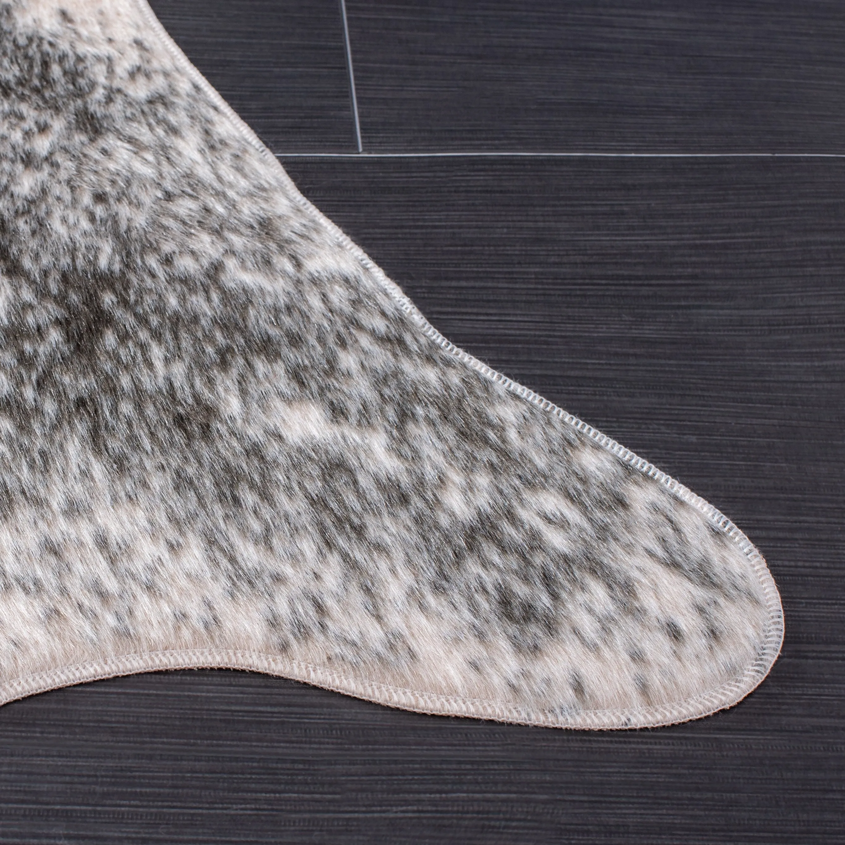 SAFAVIEH Faux Cow Hide Sinne Animal Rug