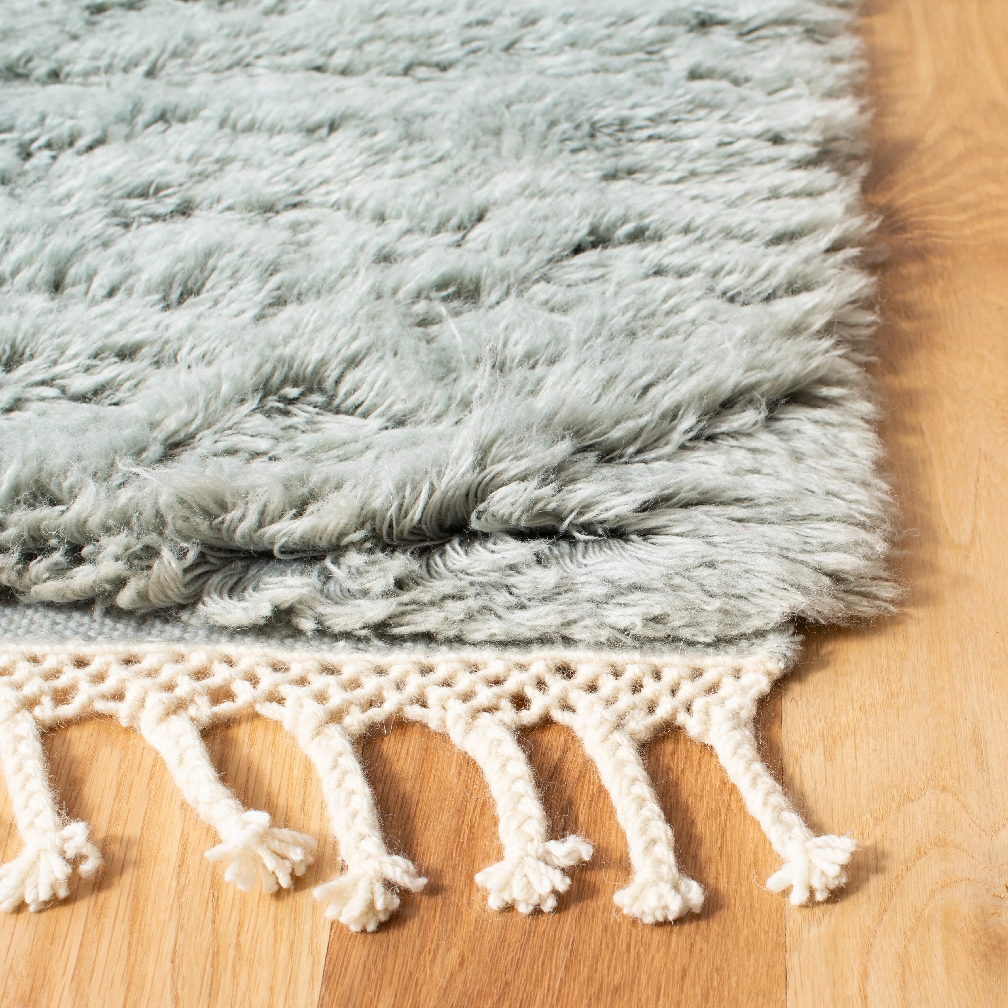 SAFAVIEH Hand-knotted Casablanca Shag Seva Tribal Wool Rug