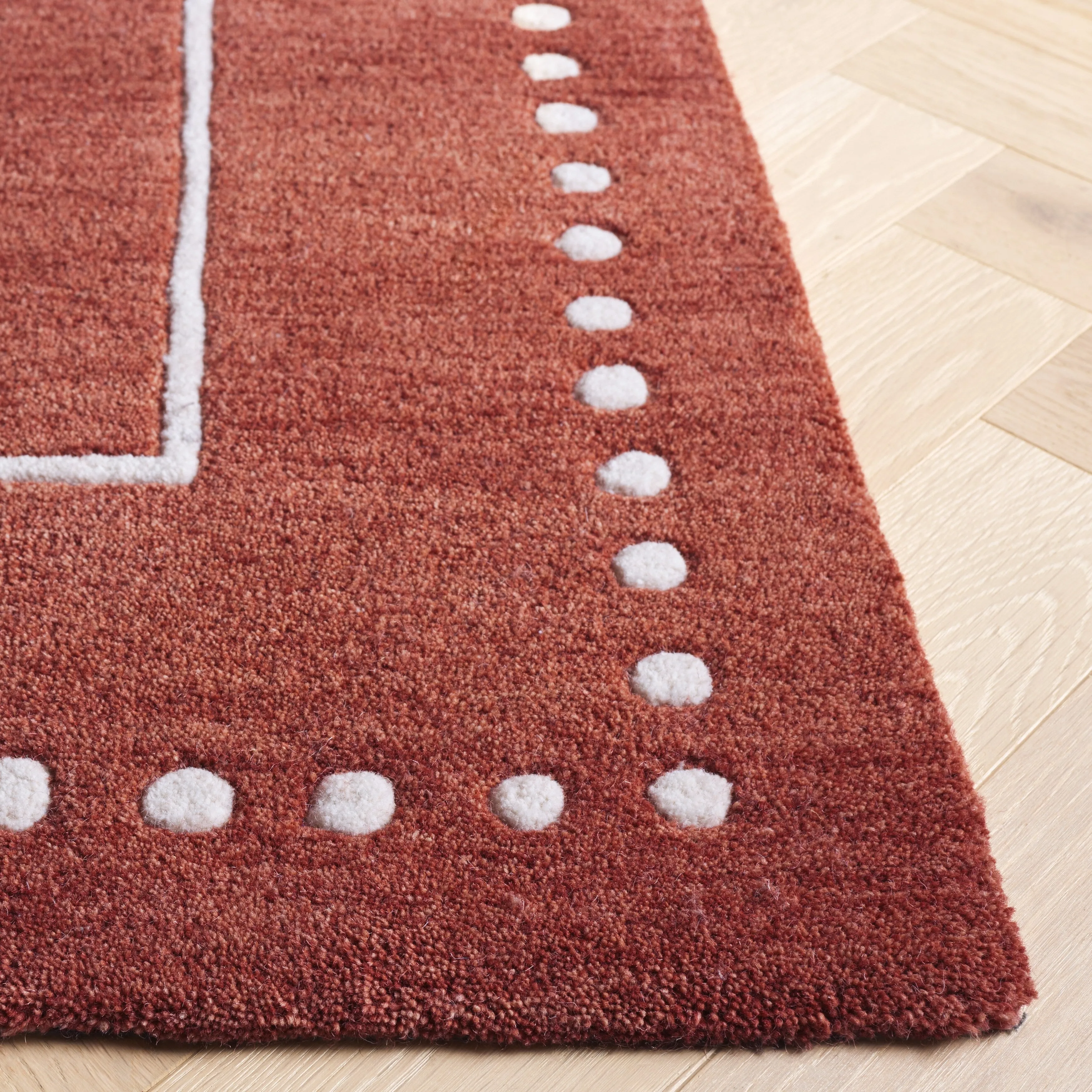 SAFAVIEH Handmade Bella Mitana Dotted Border Wool Rug