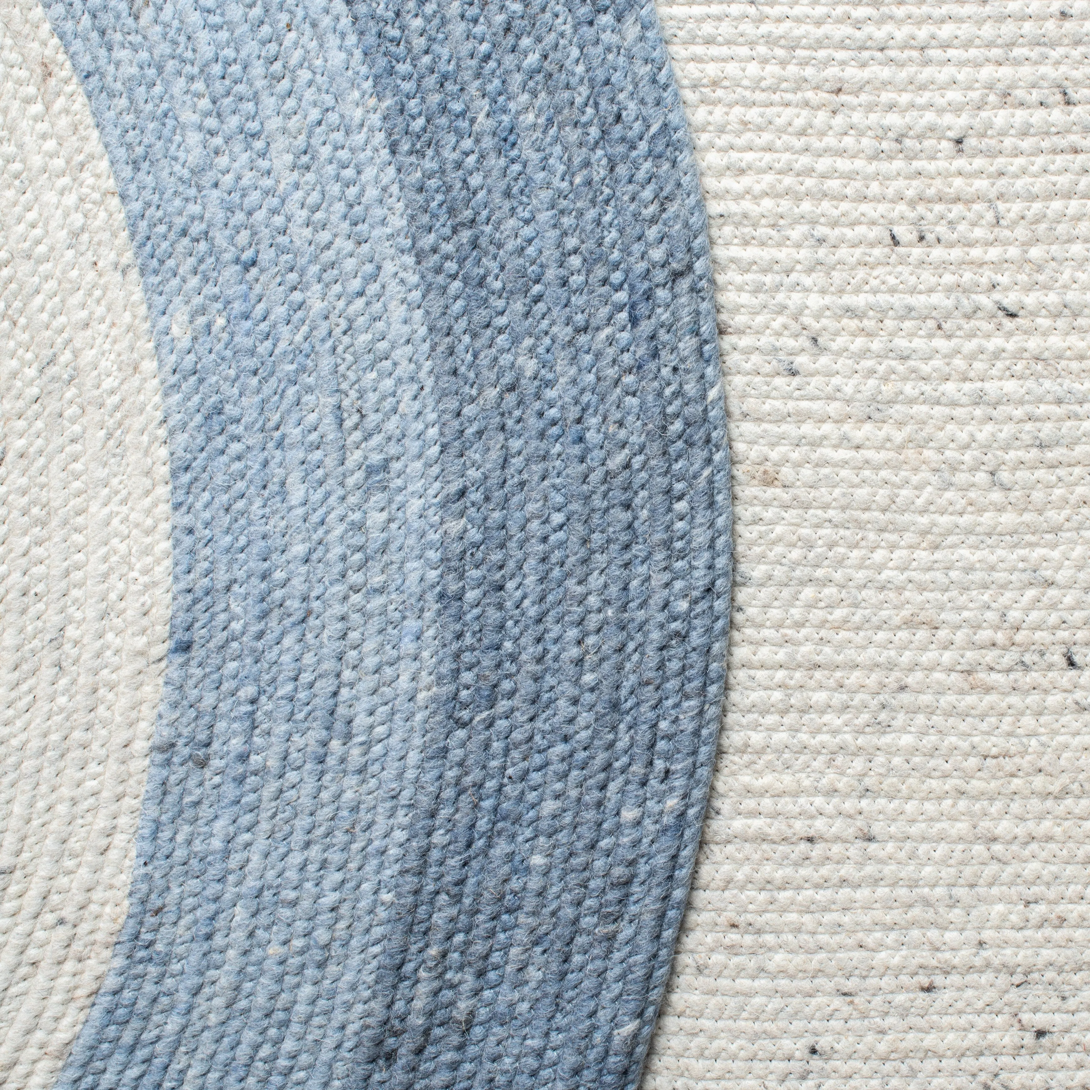 SAFAVIEH Handmade Braided Merve Wool Rug