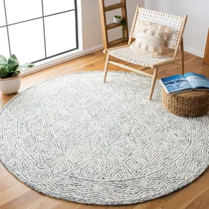 SAFAVIEH. Handmade Capri Valbjorg Contemporary Wool Rug