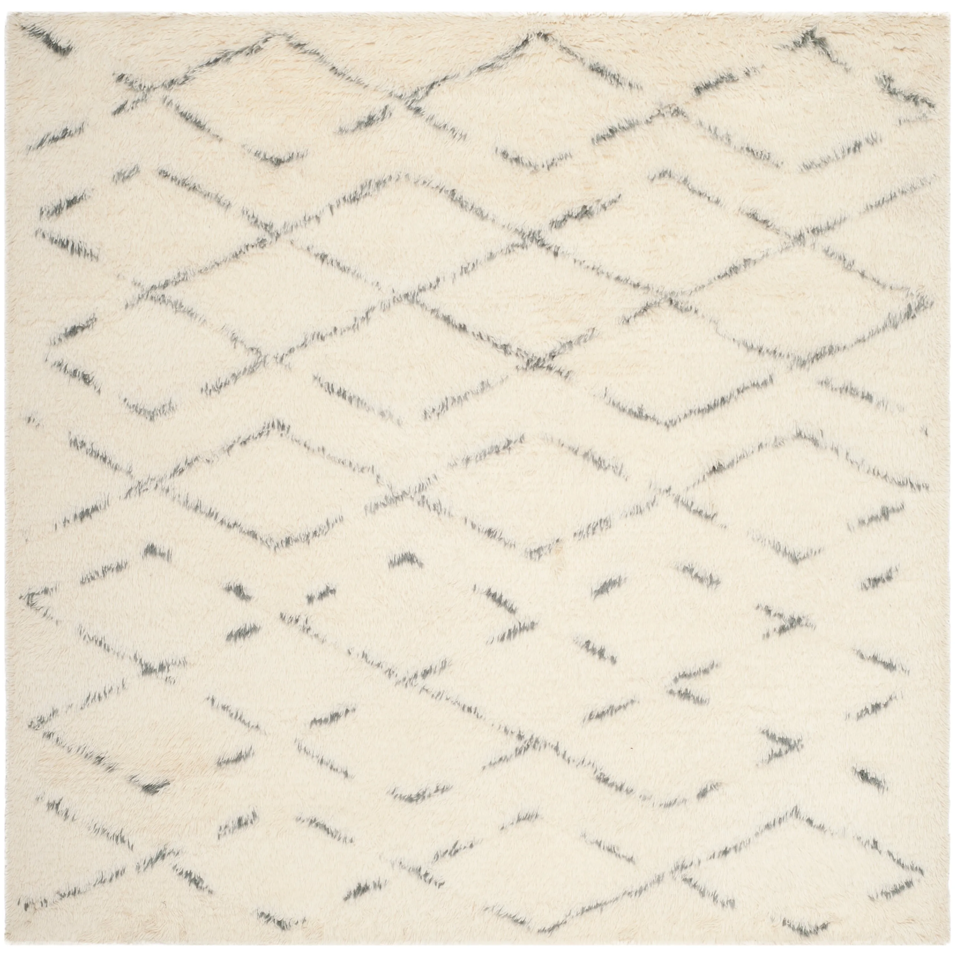 SAFAVIEH Handmade Casablanca Shag Dorette Tribal Wool Rug
