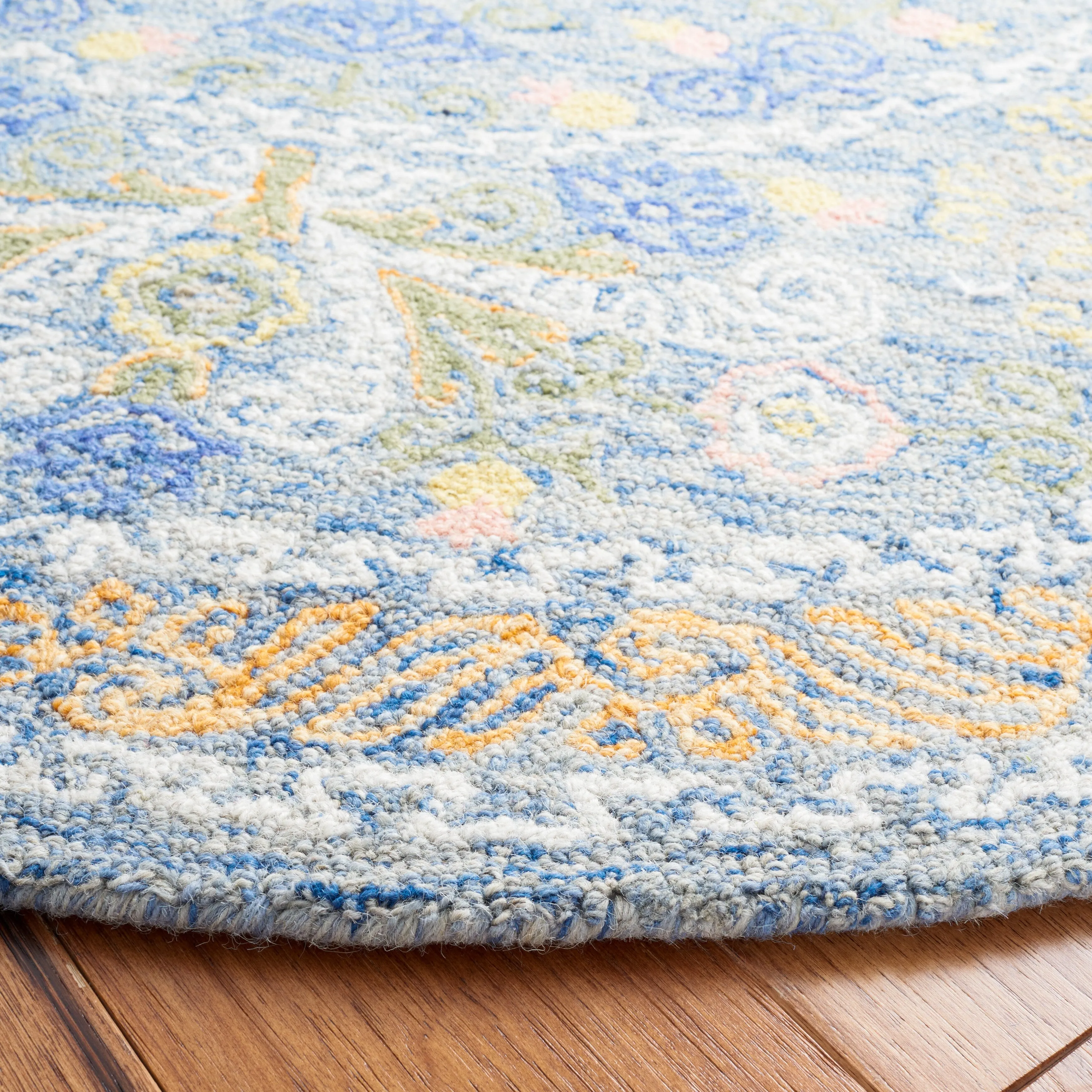SAFAVIEH Handmade Celedonia Modern Medallion Micro-Loop Wool Area Rug