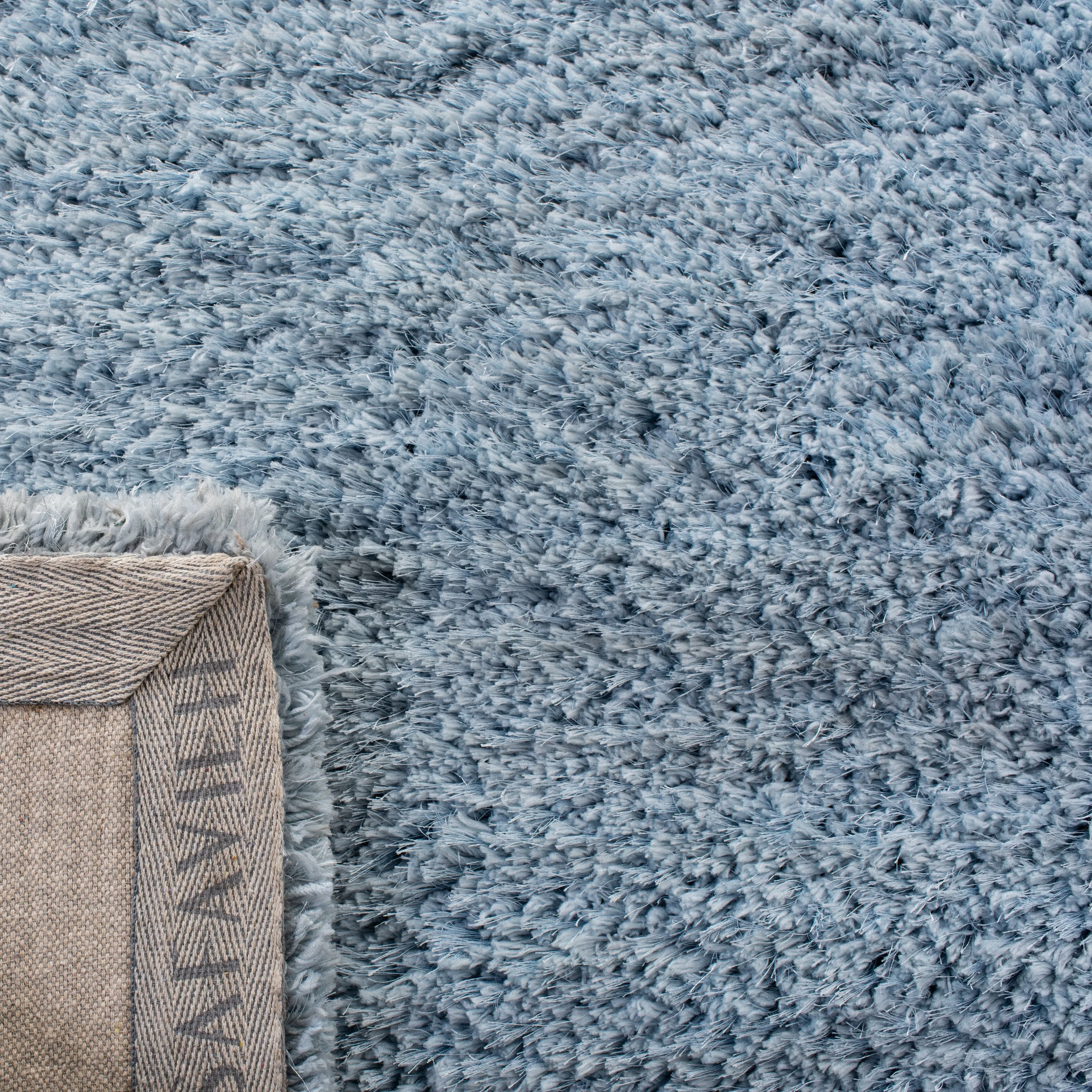 SAFAVIEH Handmade Florence Shag Isamar Solid Polyester Rug