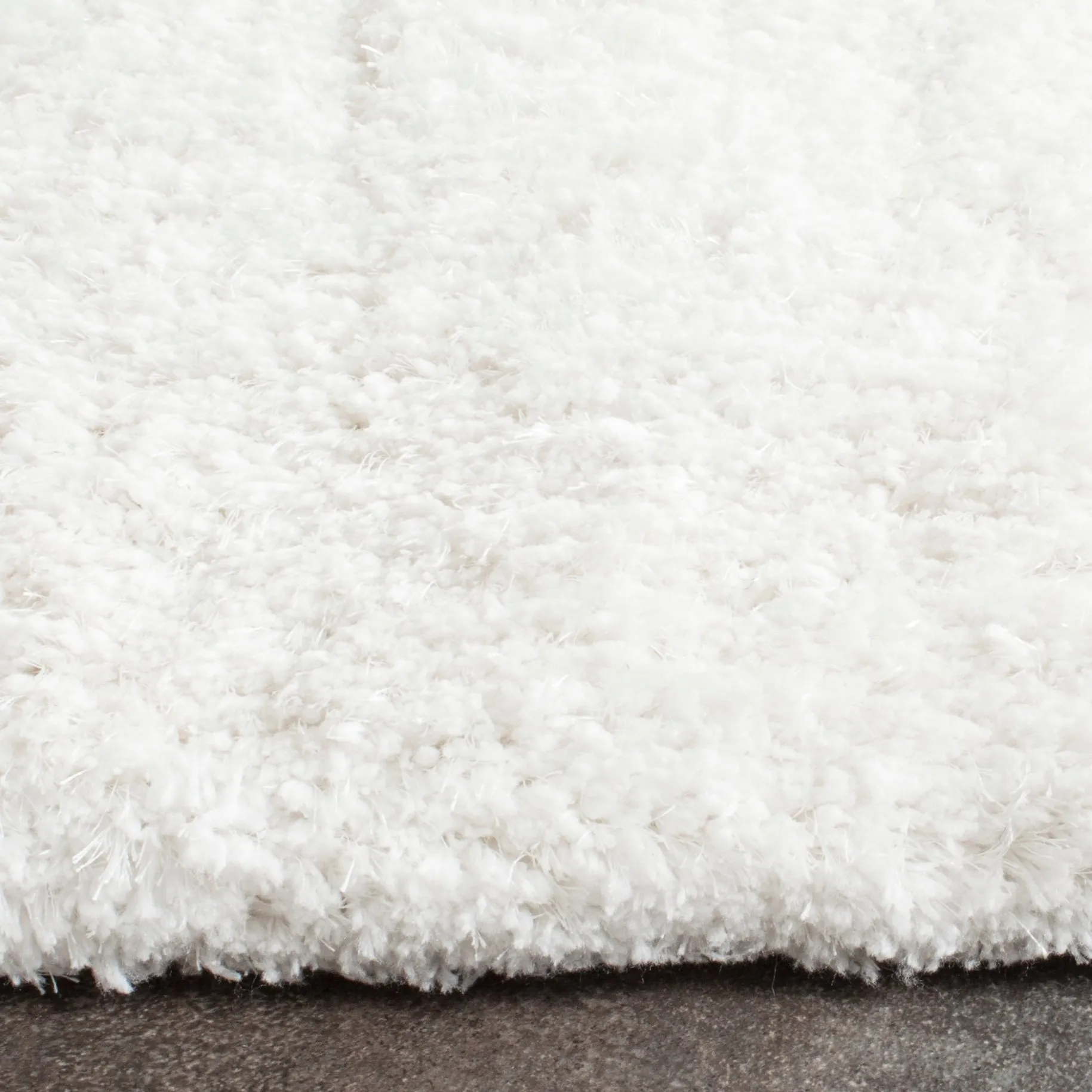 SAFAVIEH Handmade Florence Shag Isamar Solid Polyester Rug