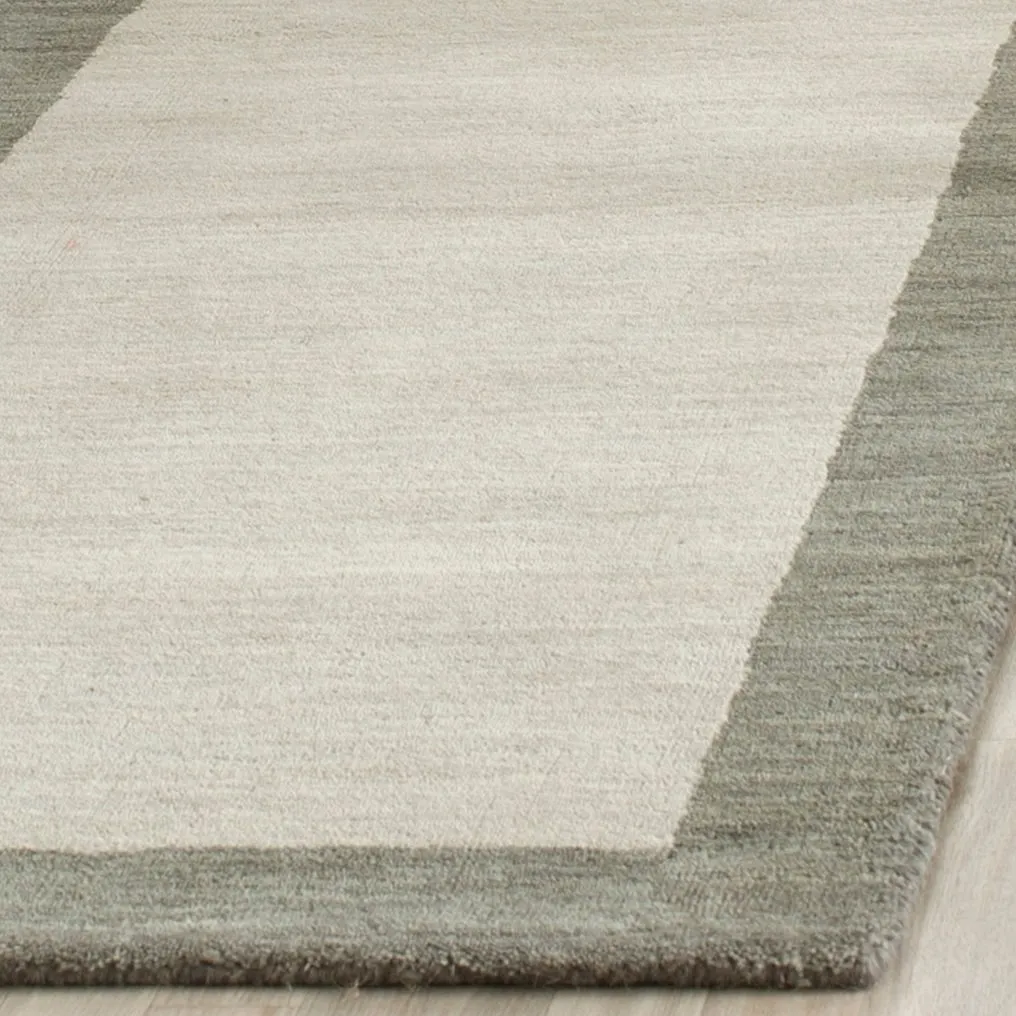 SAFAVIEH Handmade Himalaya Asrin Modern Wool Rug