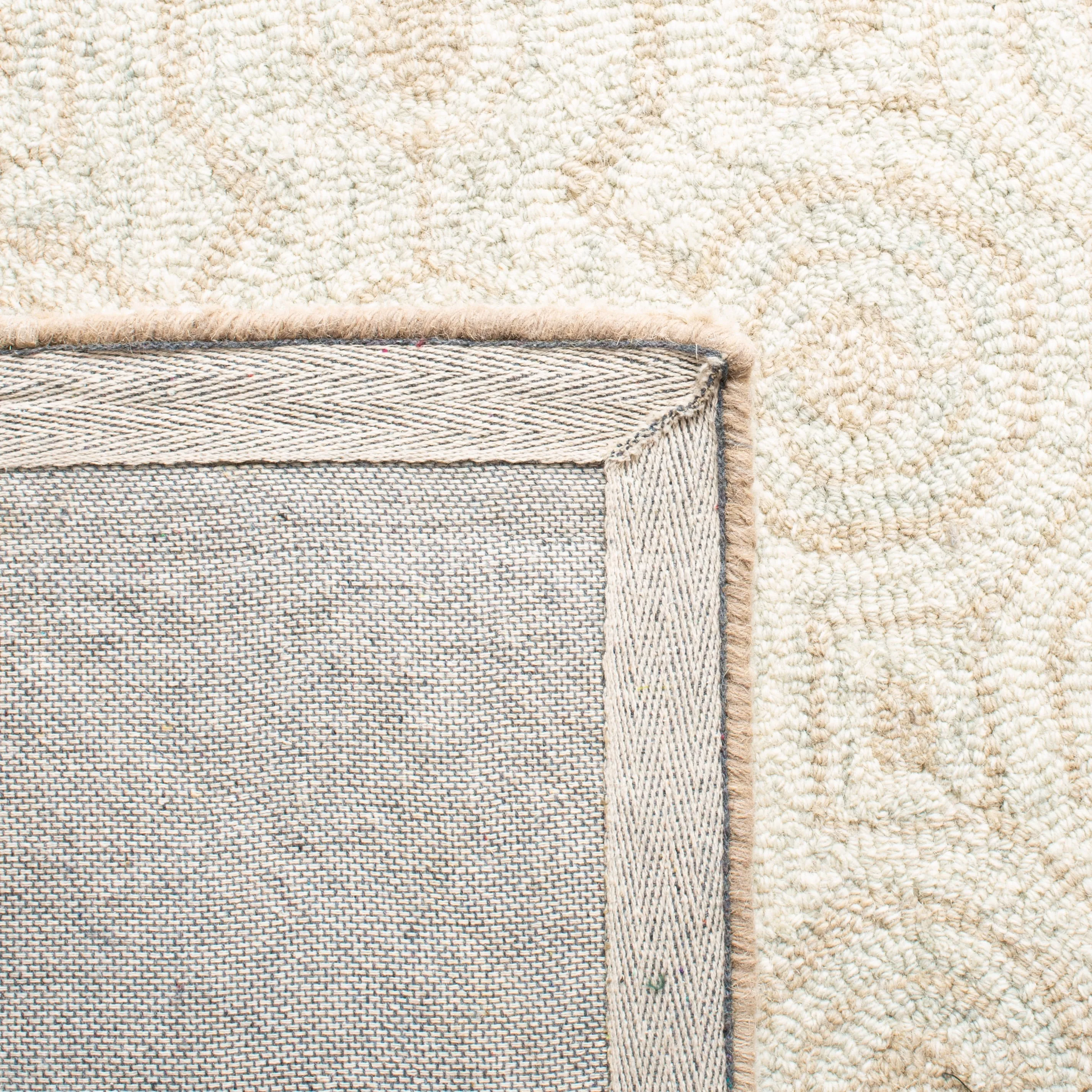 SAFAVIEH Handmade Kirila Micro-loop Modern Wool Area Rug