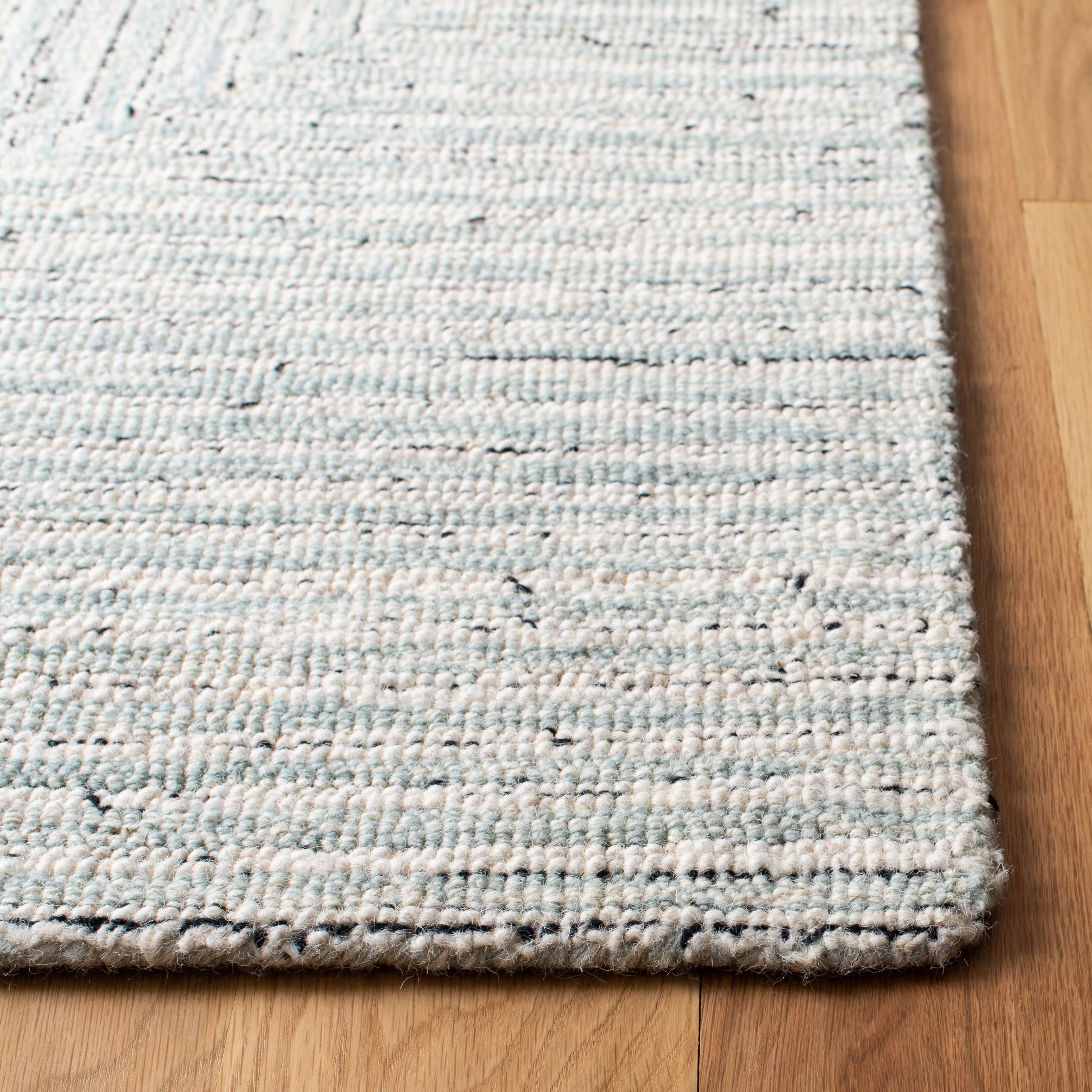 SAFAVIEH Handmade Micro-Loop Nausica Modern Wool Rug