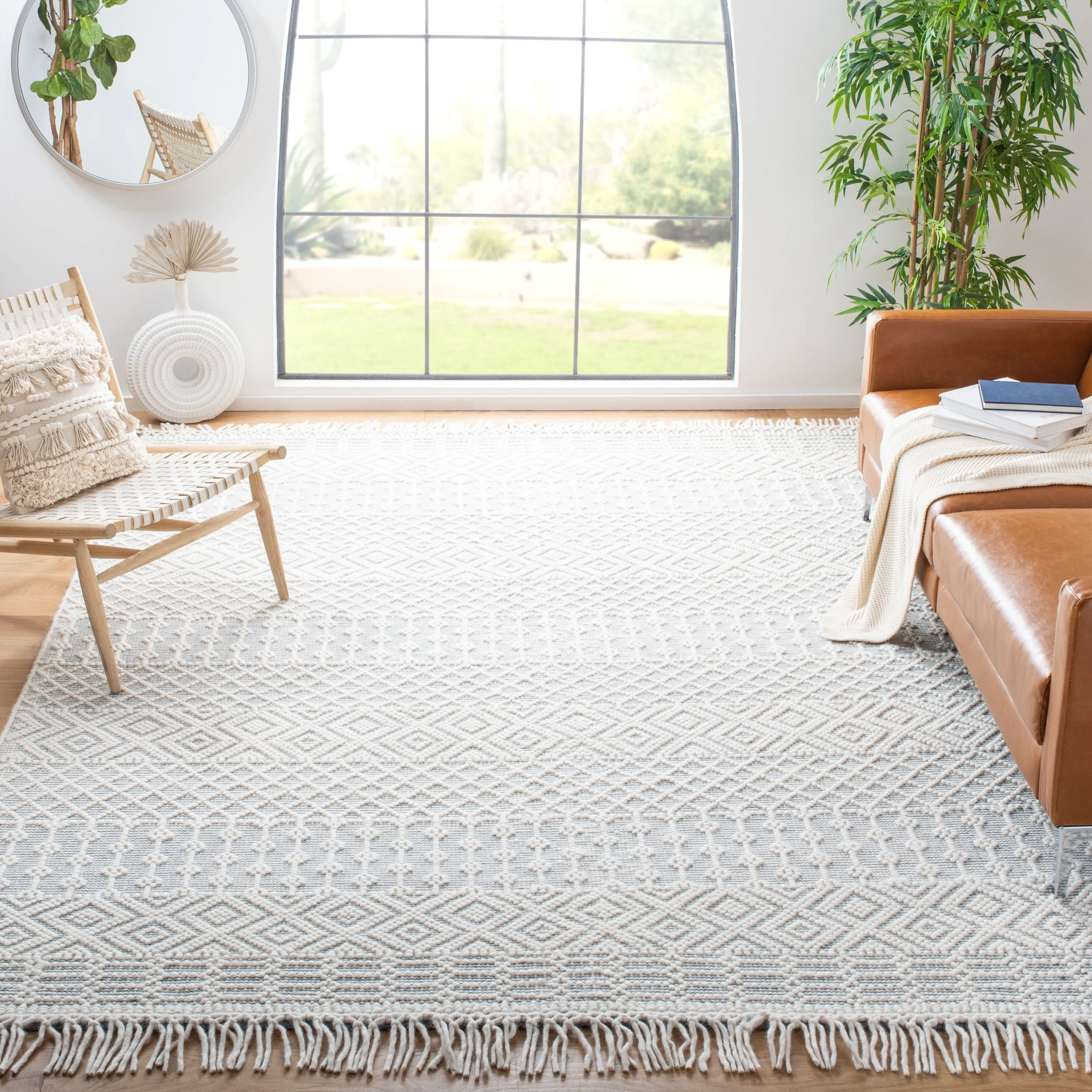 SAFAVIEH Handmade Natura Estel Wool Fringe Rug