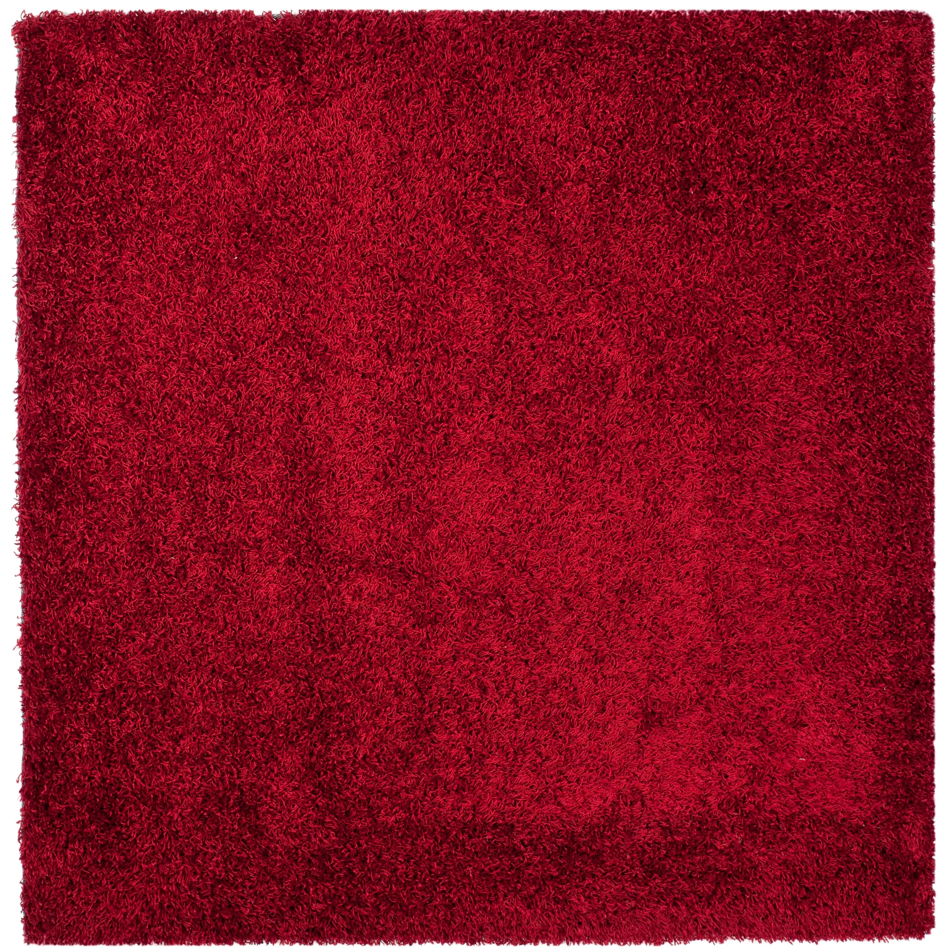 SAFAVIEH Handmade Rubi Shag Mevlide Solid Polyester Rug