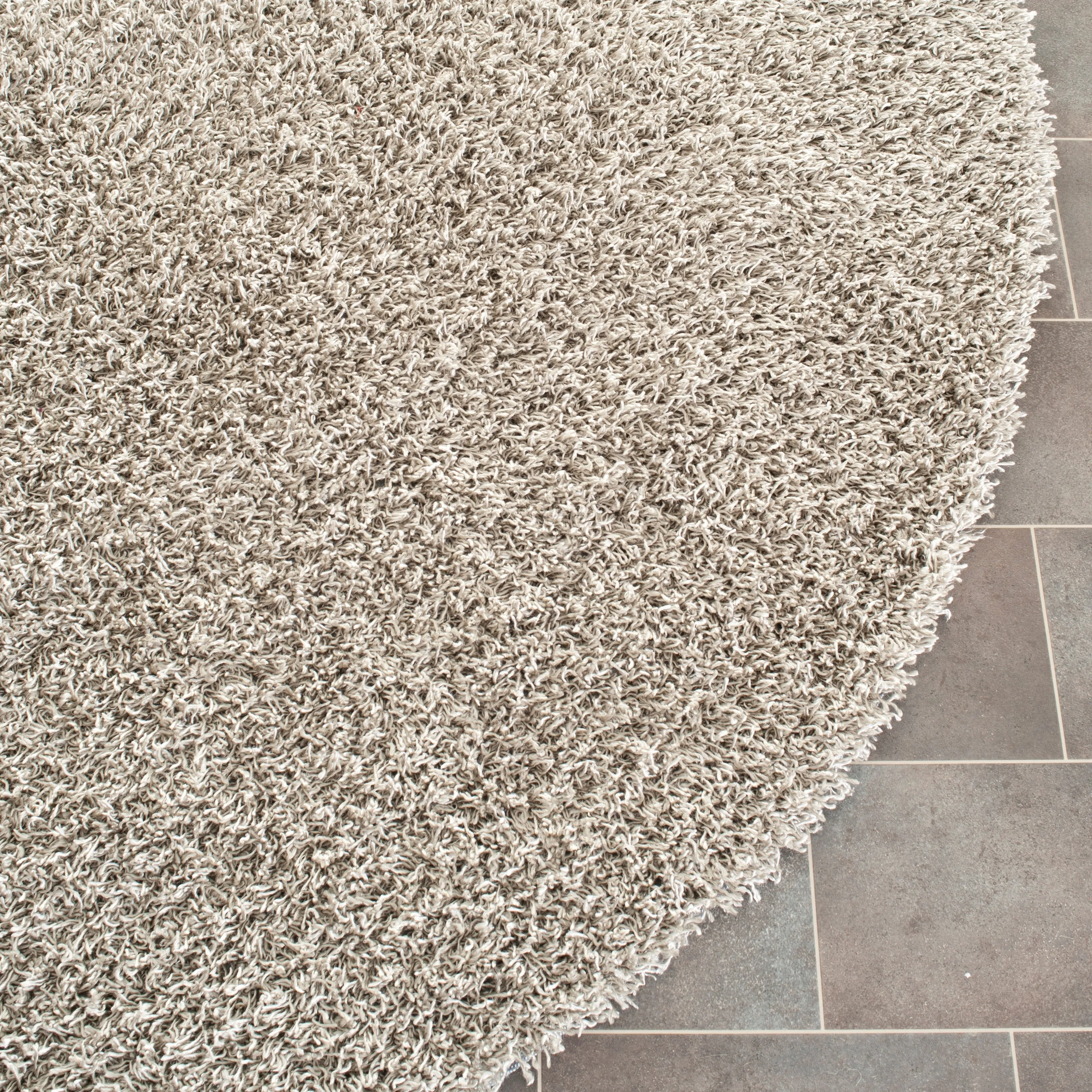 SAFAVIEH Handmade Rubi Shag Mevlide Solid Polyester Rug