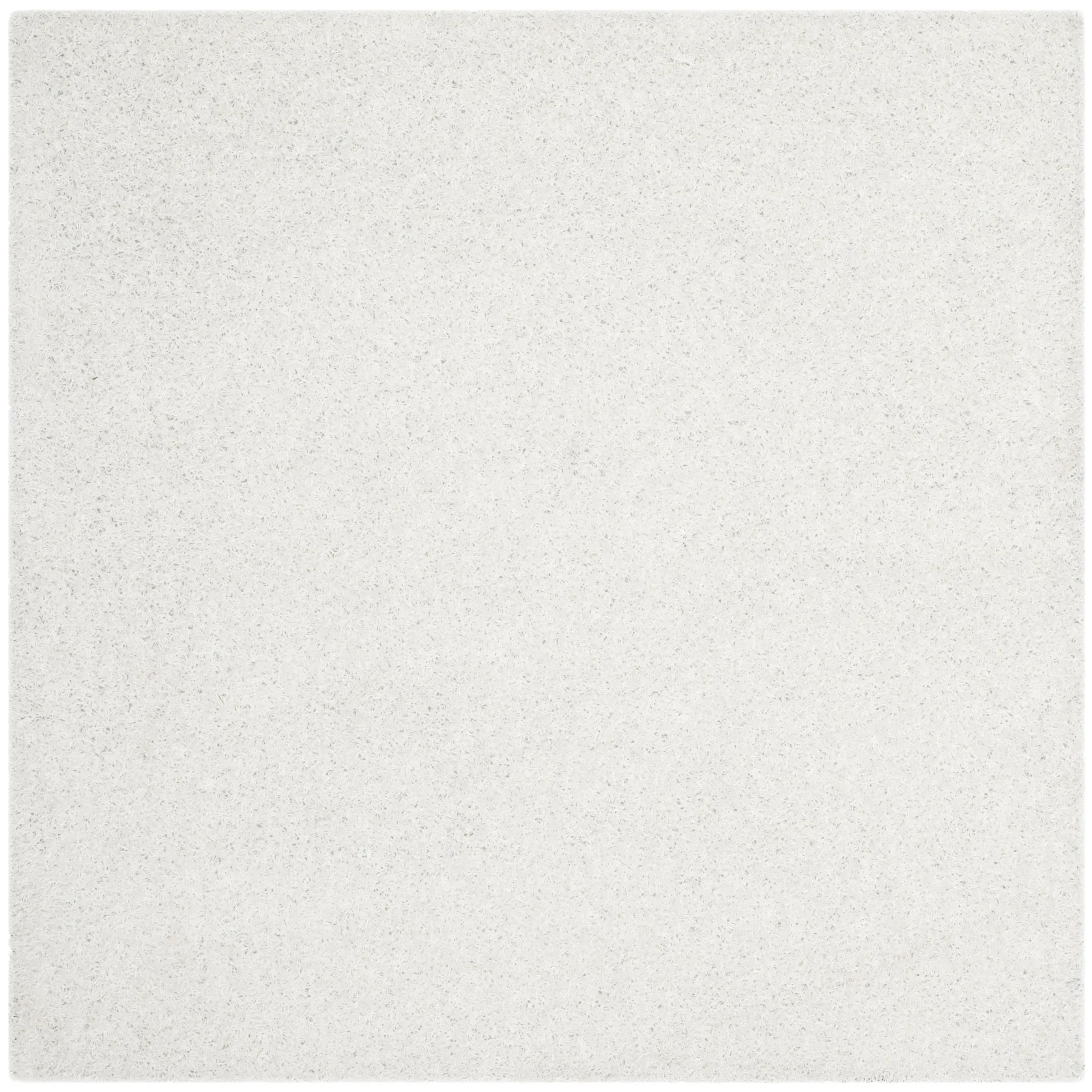 SAFAVIEH Handmade Rubi Shag Mevlide Solid Polyester Rug