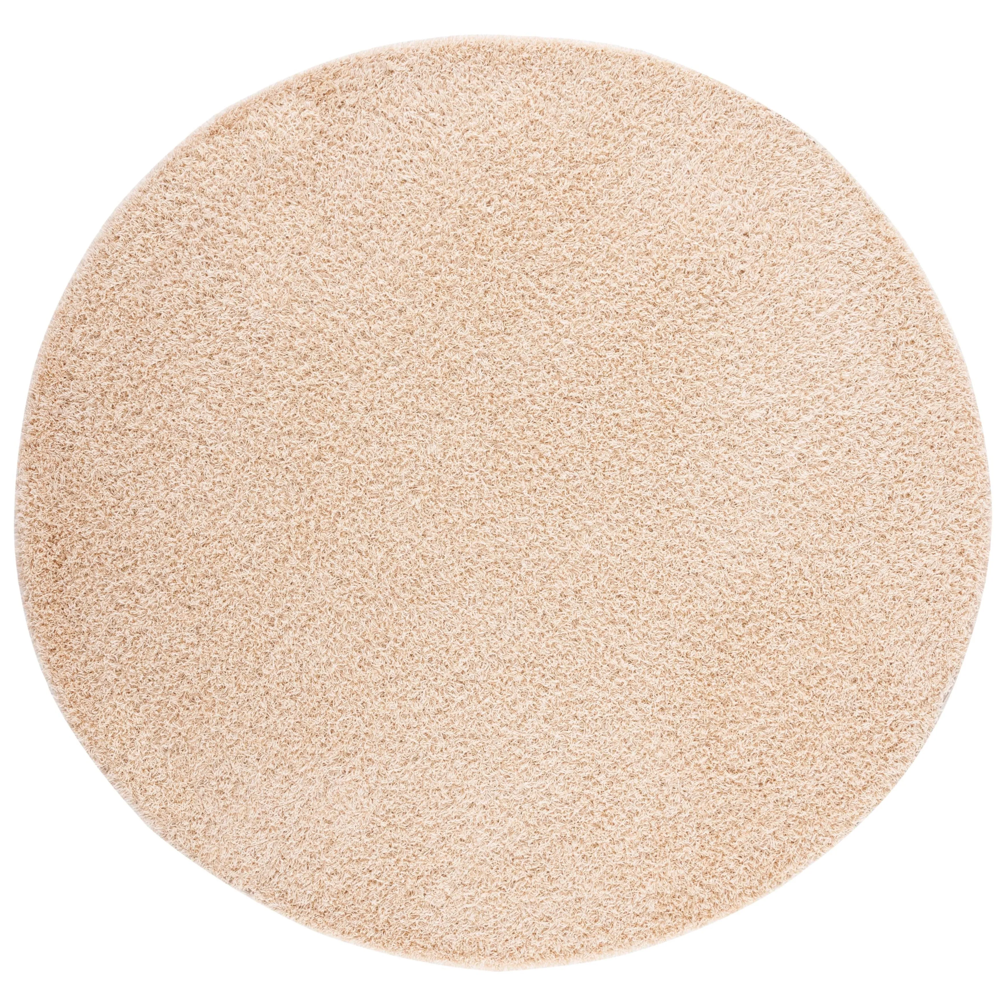 SAFAVIEH Handmade Rubi Shag Mevlide Solid Polyester Rug