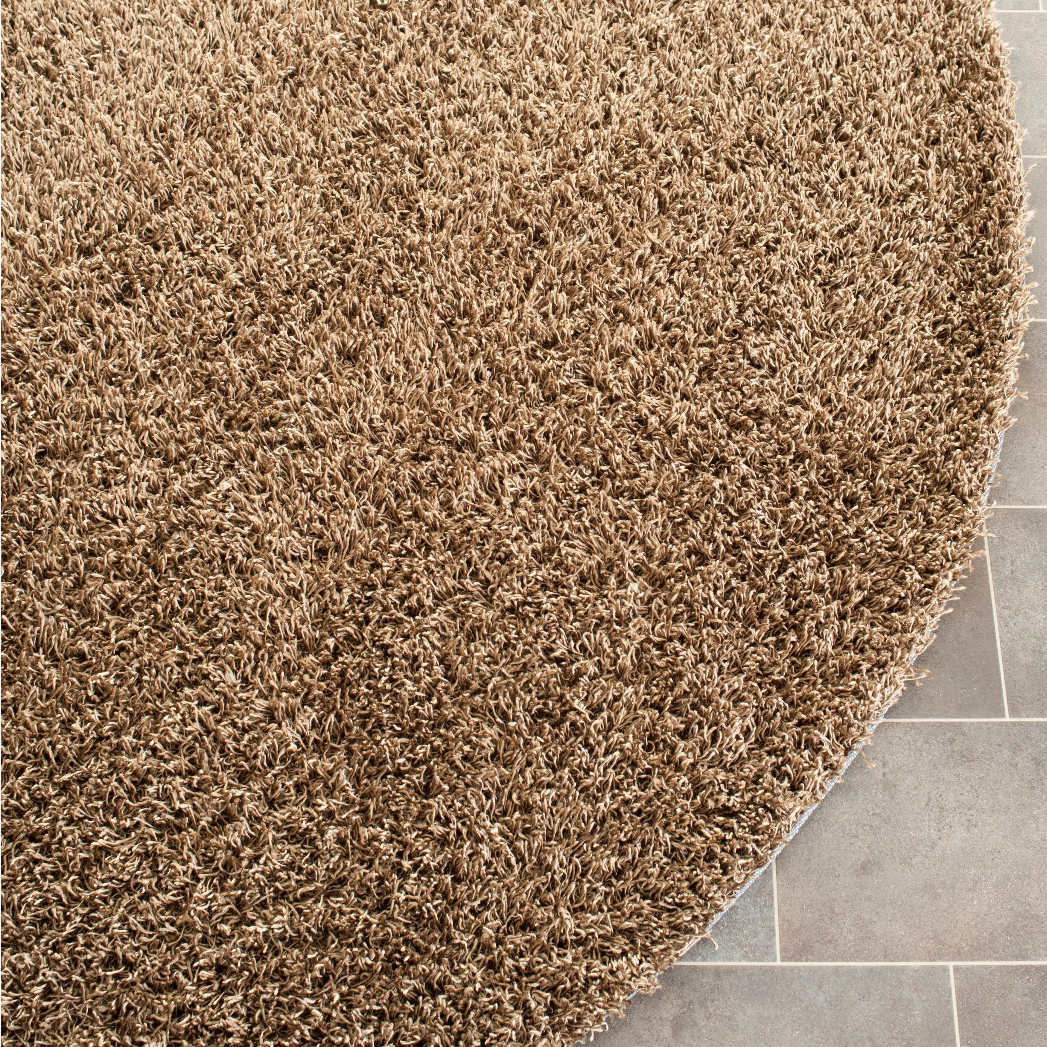 SAFAVIEH Handmade Rubi Shag Mevlide Solid Polyester Rug