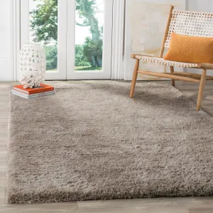 SAFAVIEH Handmade Sheep Shag Dochia Solid Polyester Rug