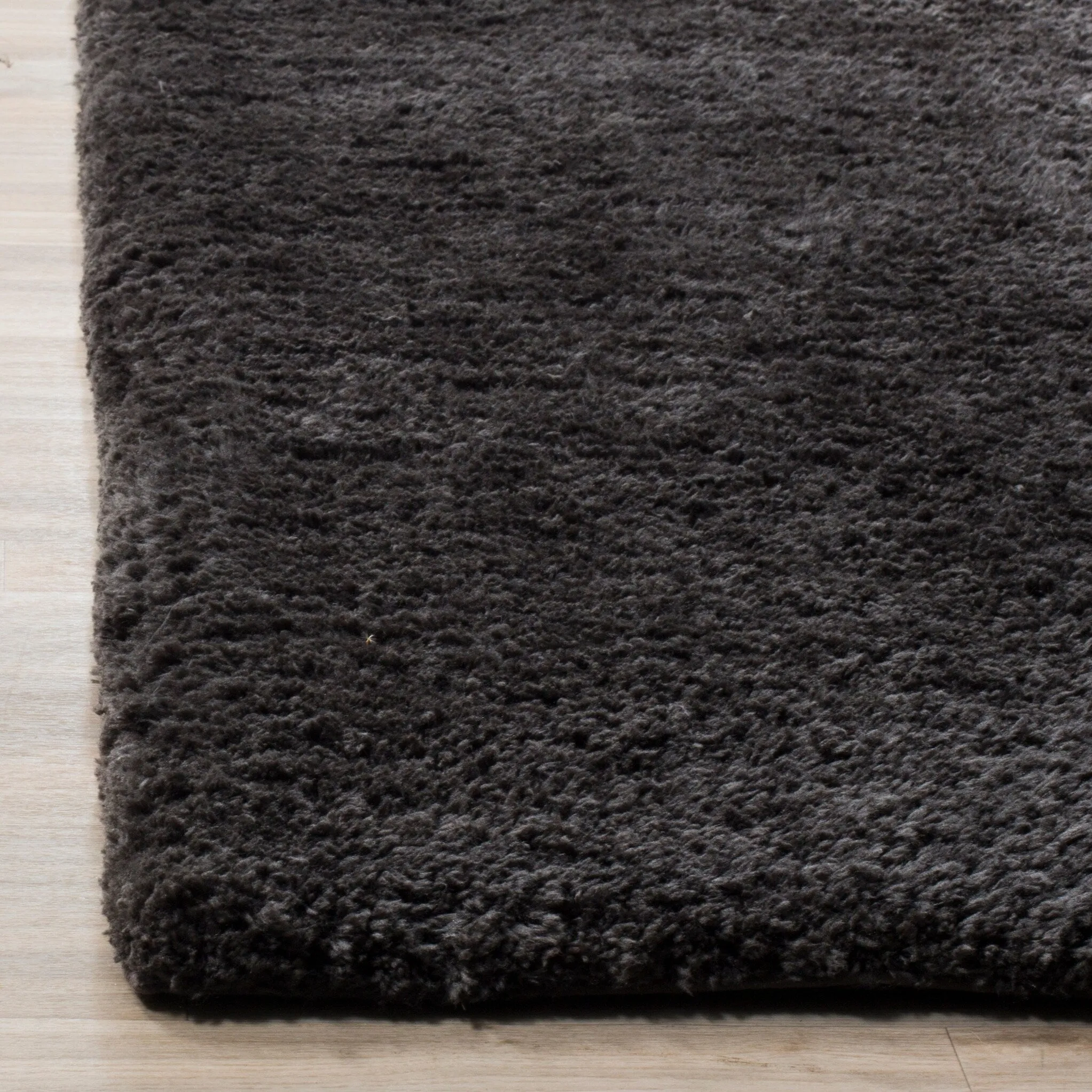 SAFAVIEH Handmade Sheep Shag Dochia Solid Polyester Rug