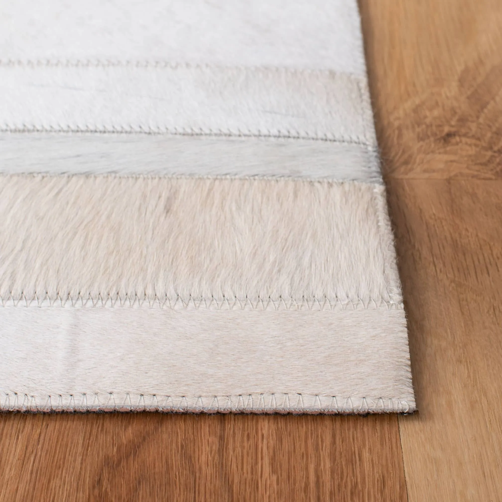 SAFAVIEH Handmade Studio Leather Daniele Natural Hide Leather Rug