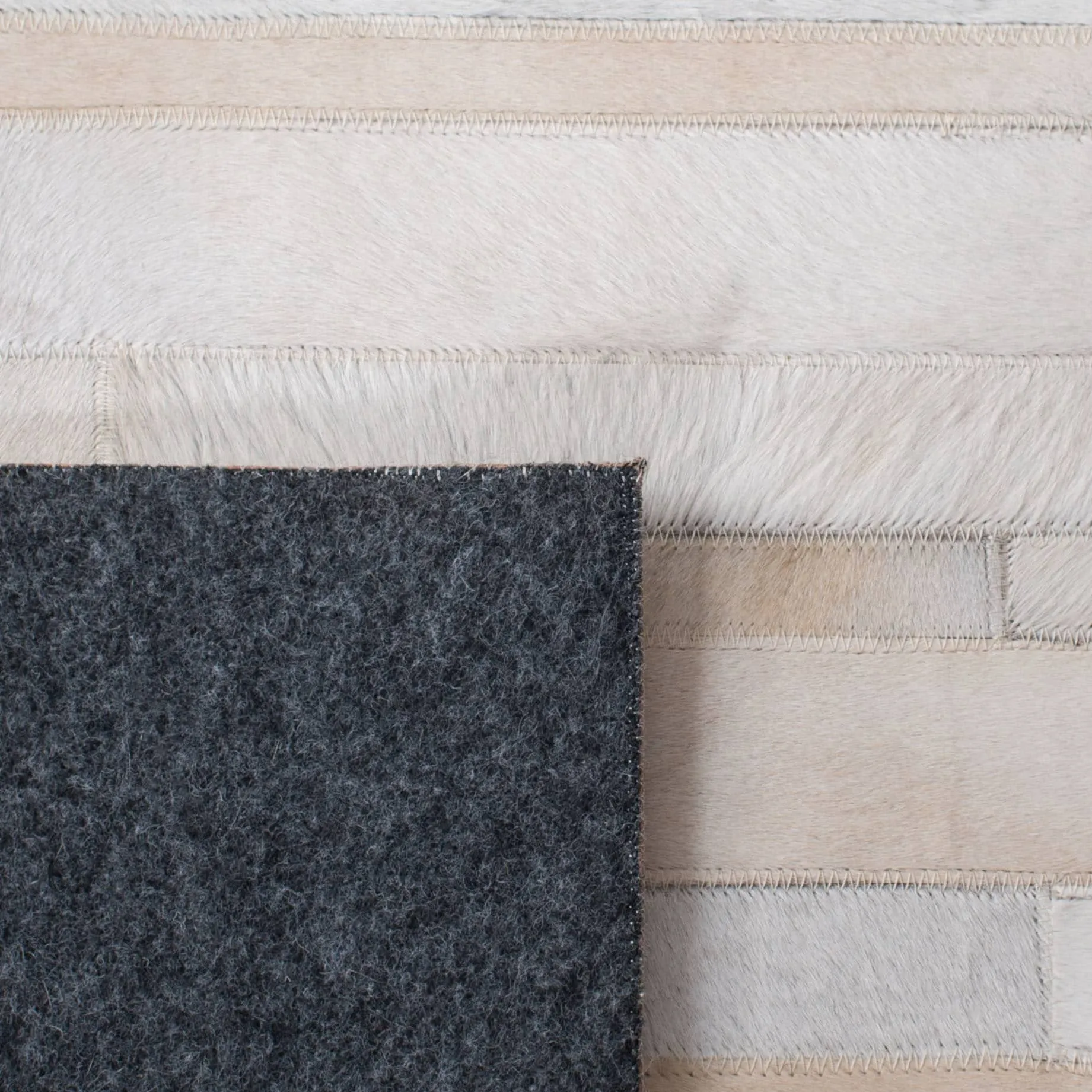 SAFAVIEH Handmade Studio Leather Daniele Natural Hide Leather Rug