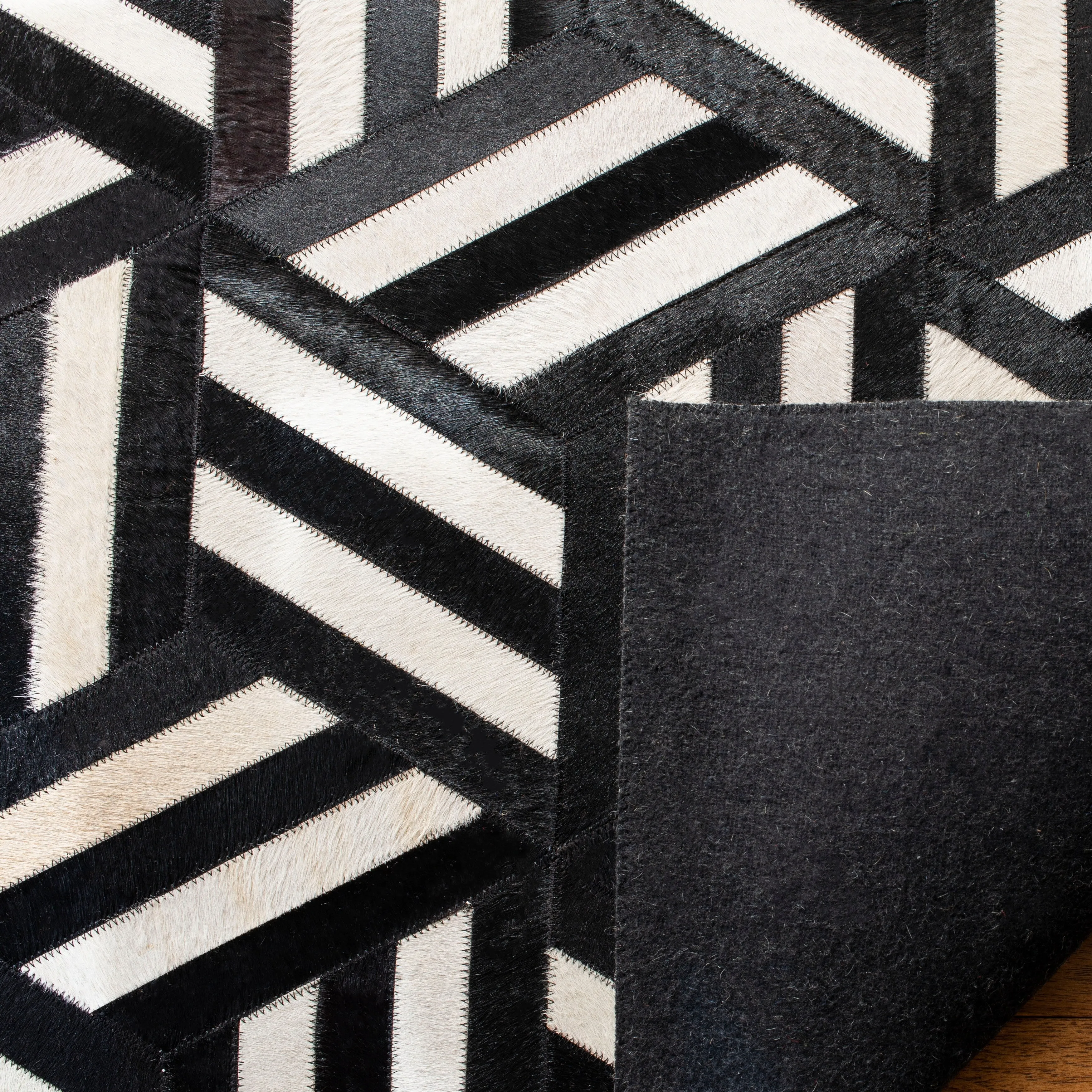 SAFAVIEH Handmade Studio Leather Farrah Modern Leather Rug