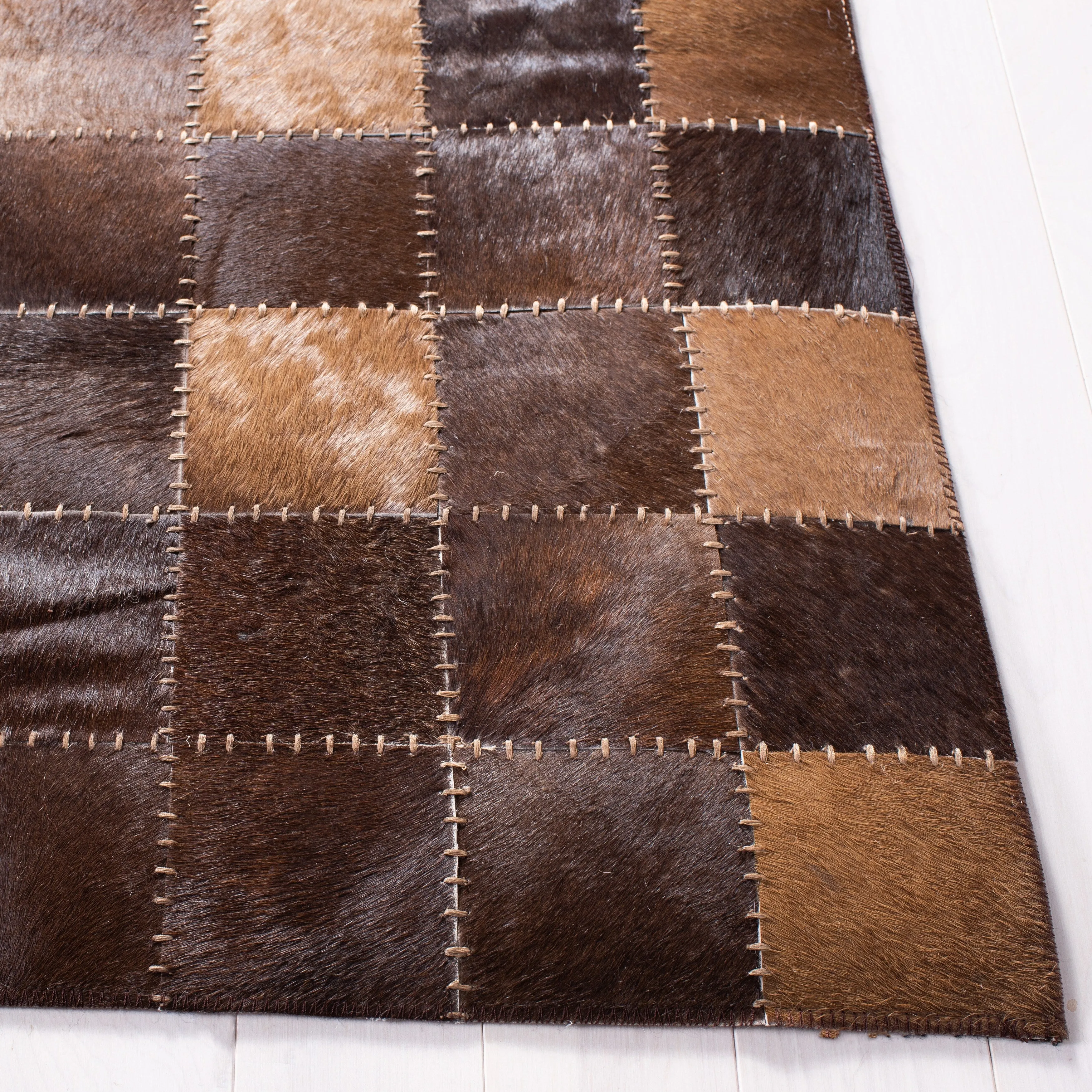SAFAVIEH Handmade Studio Leather Luciana Natural Hide Leather Rug