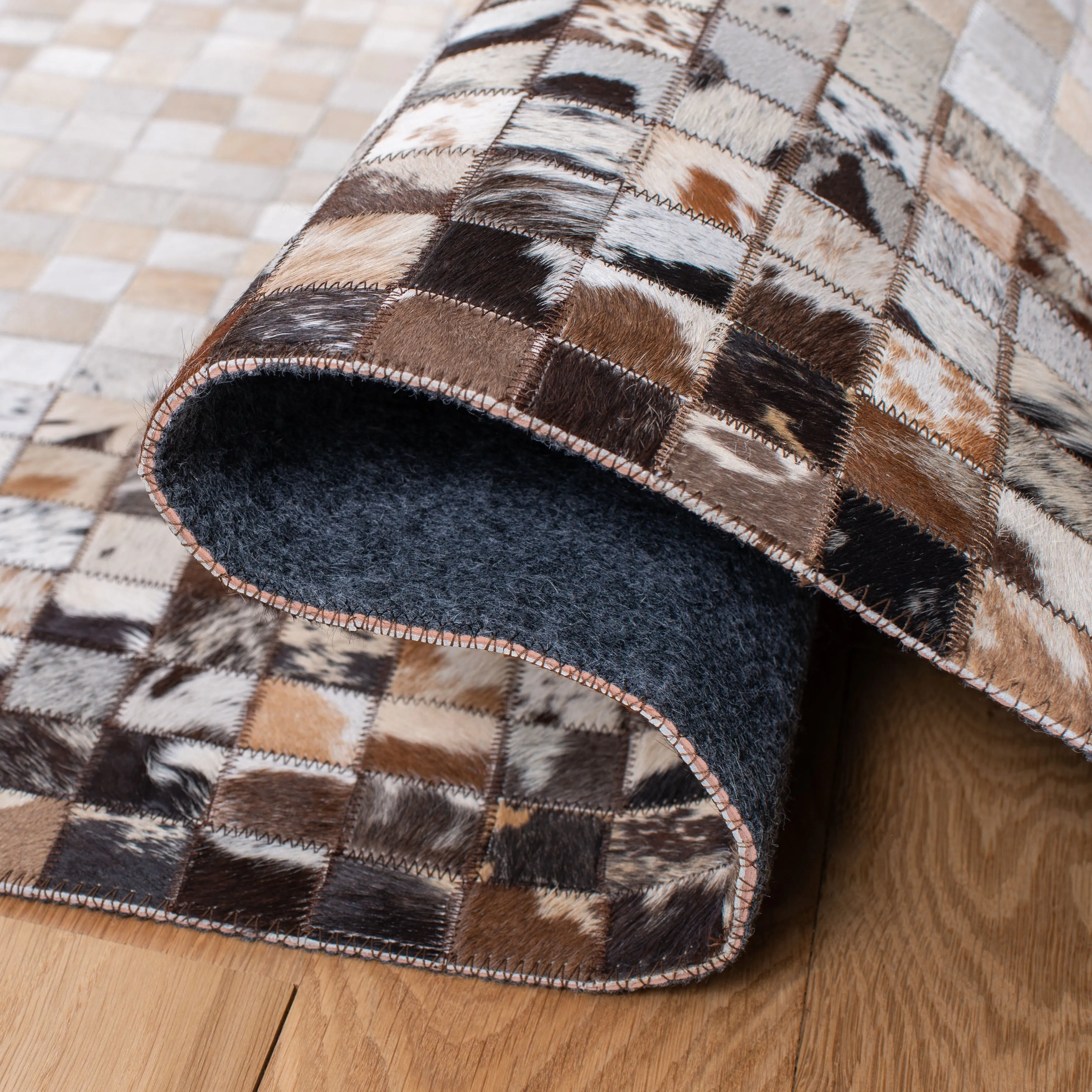 SAFAVIEH Handmade Studio Leather Mistie Natural Hide Leather Rug