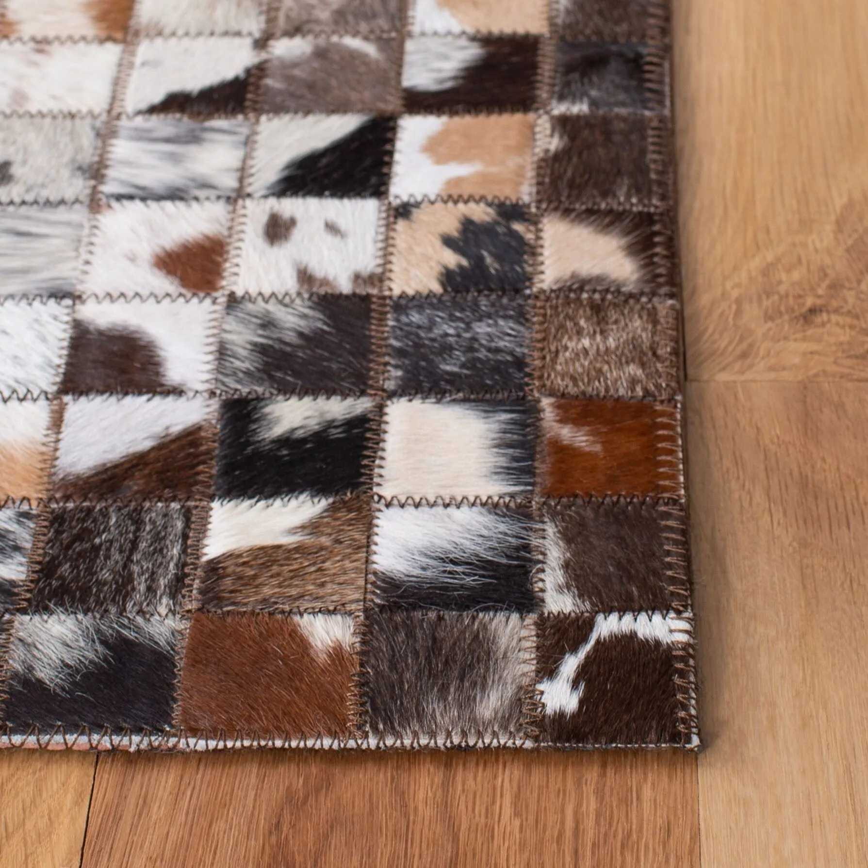 SAFAVIEH Handmade Studio Leather Mistie Natural Hide Leather Rug