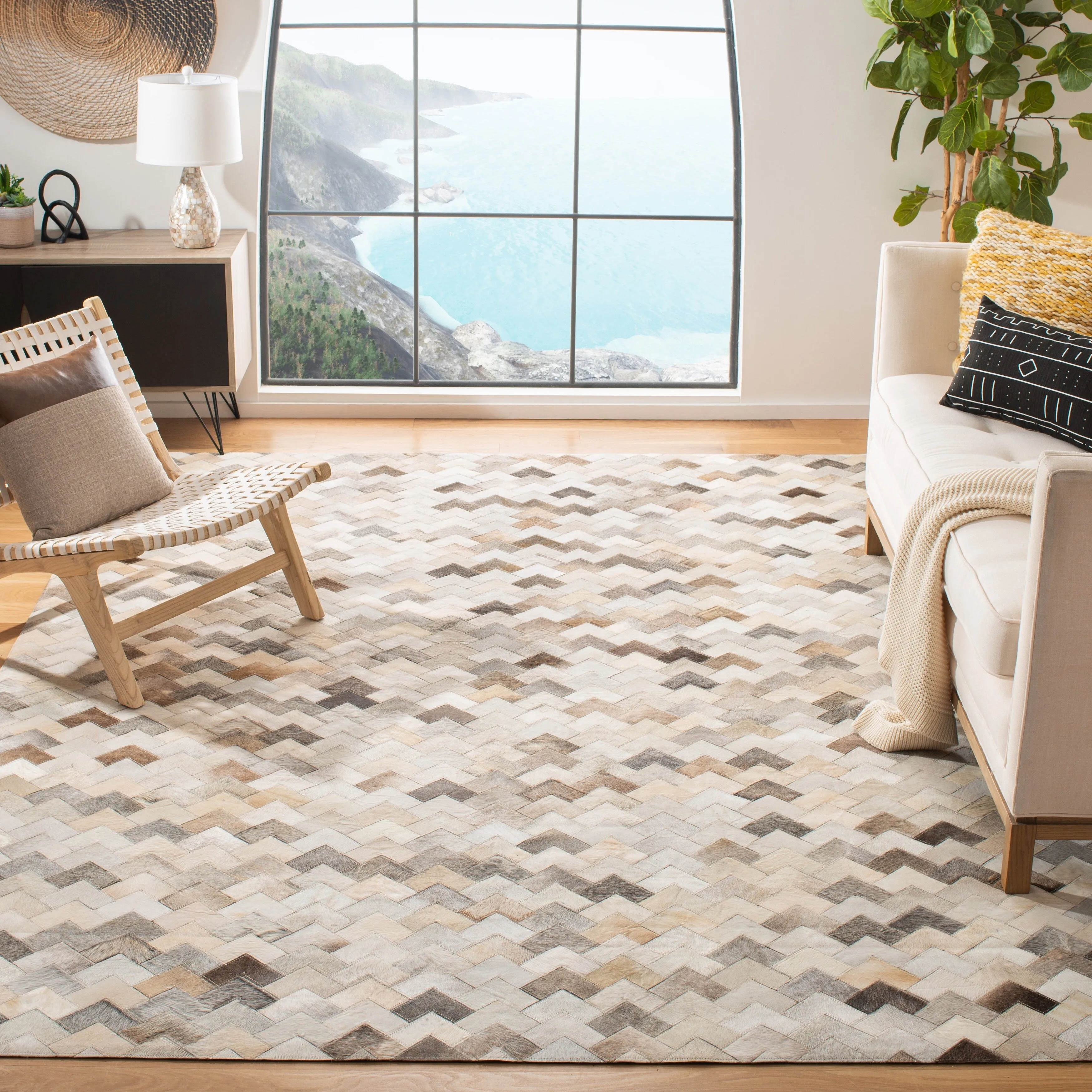 SAFAVIEH Handmade Studio Leather Momo Modern Leather Rug