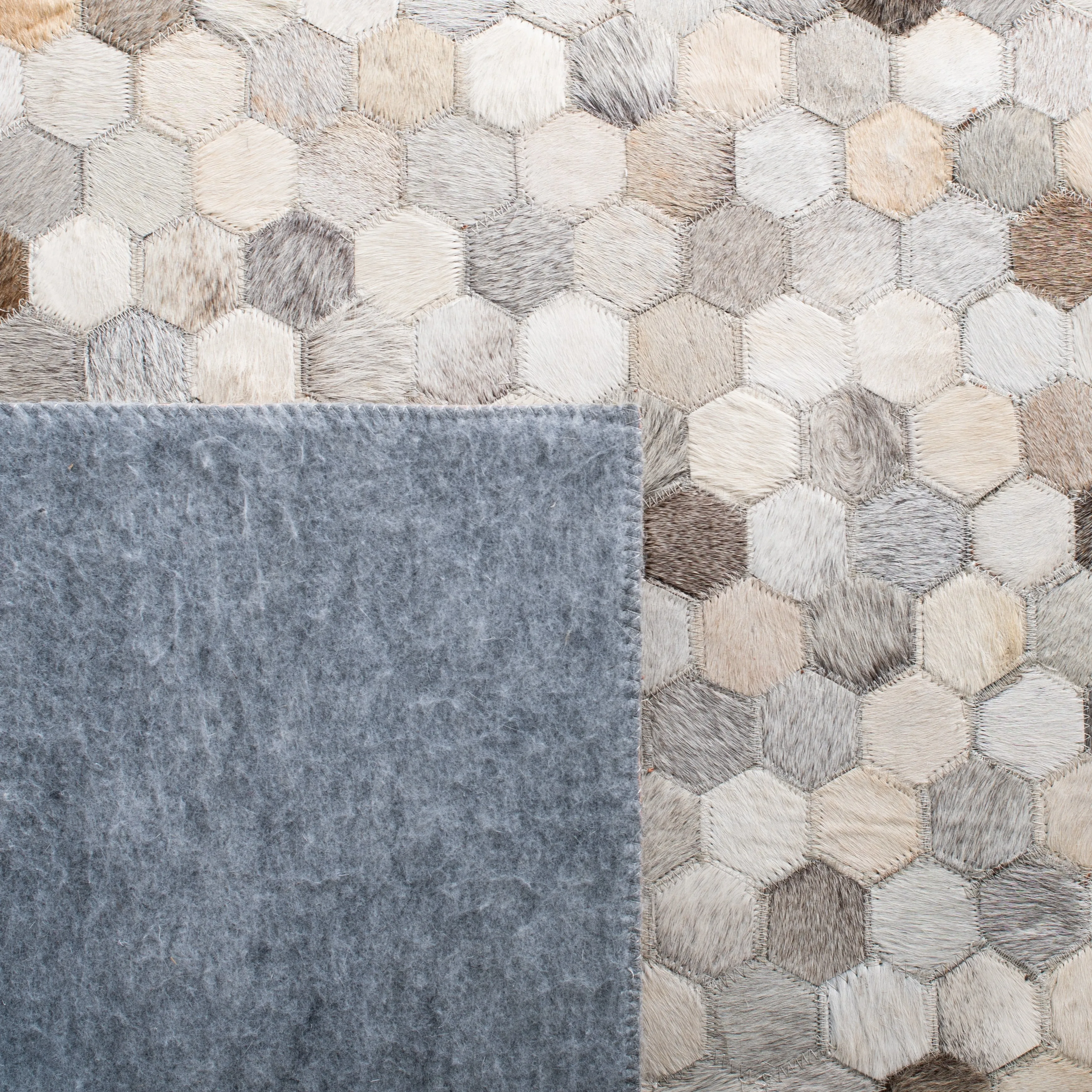 SAFAVIEH Handmade Studio Leather Nadia Modern Leather Rug