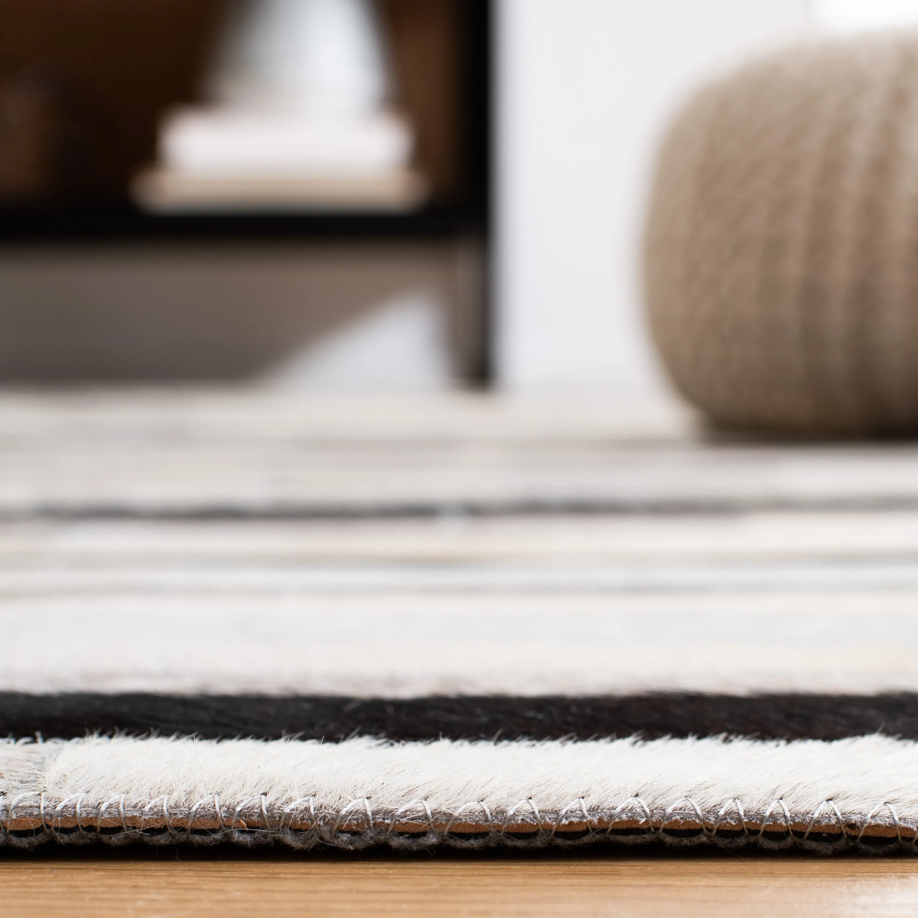 SAFAVIEH Handmade Studio Leather Syreeta Natural Hide Leather Rug