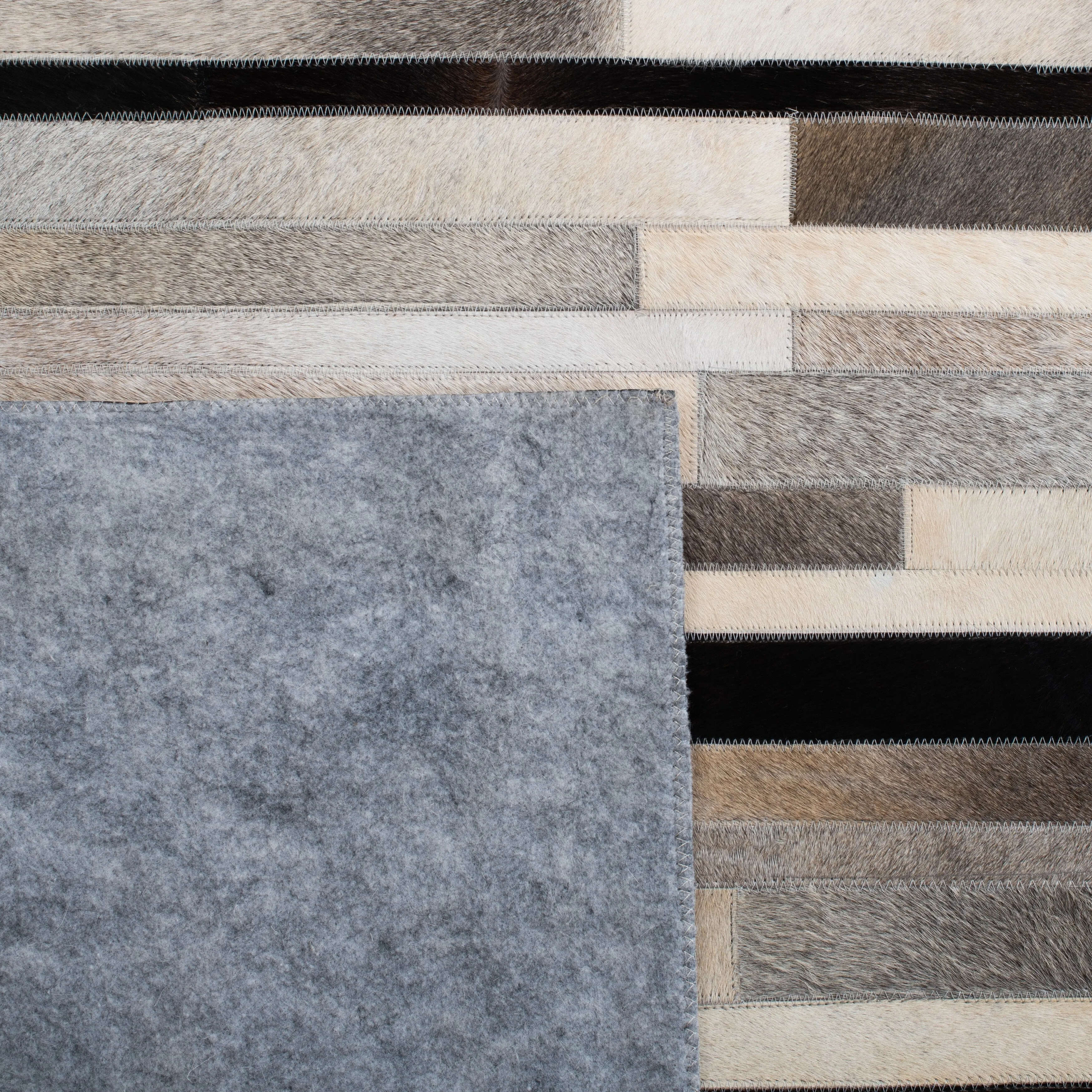 SAFAVIEH Handmade Studio Leather Syreeta Natural Hide Leather Rug