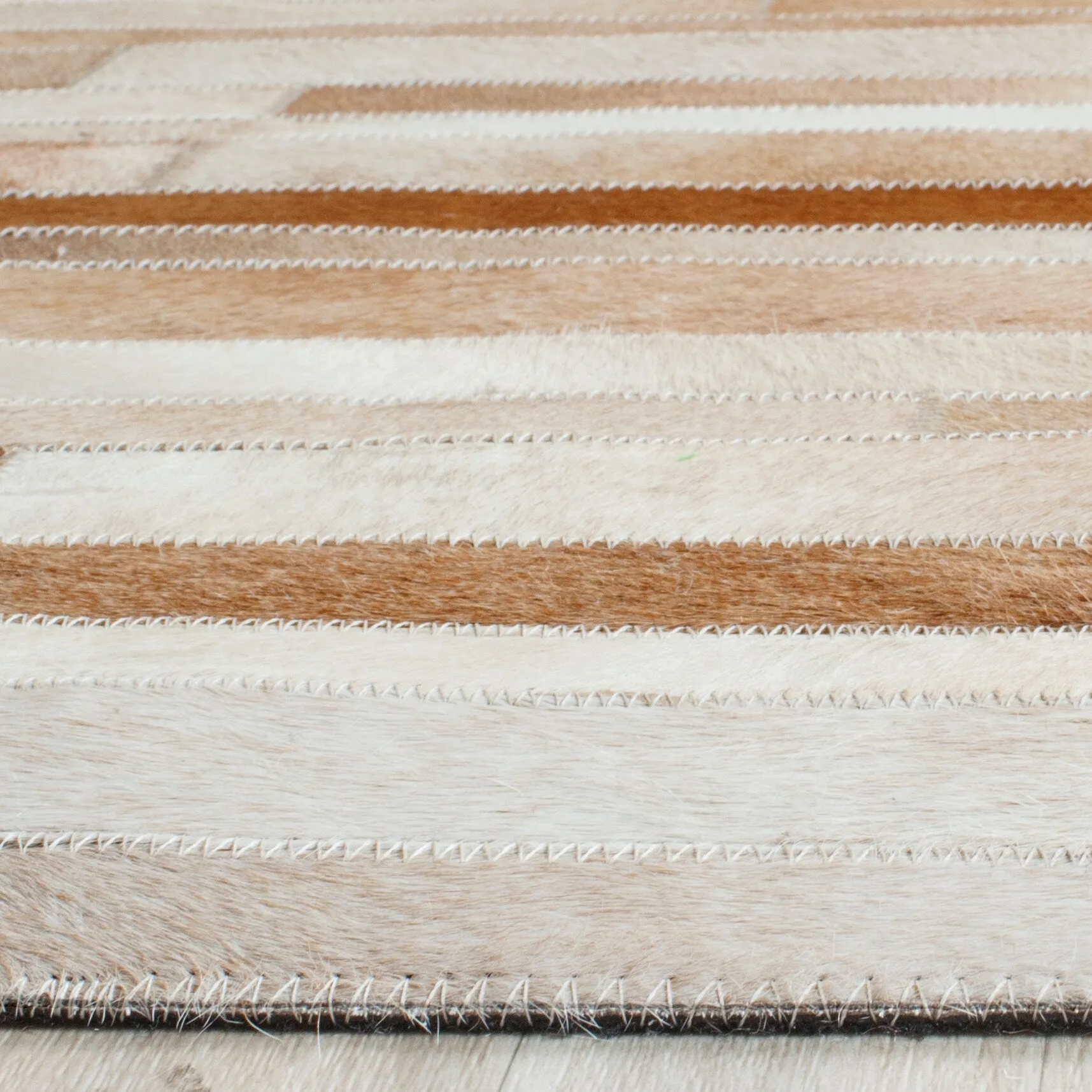 SAFAVIEH Handmade Studio Leather Tennille Modern Leather Rug